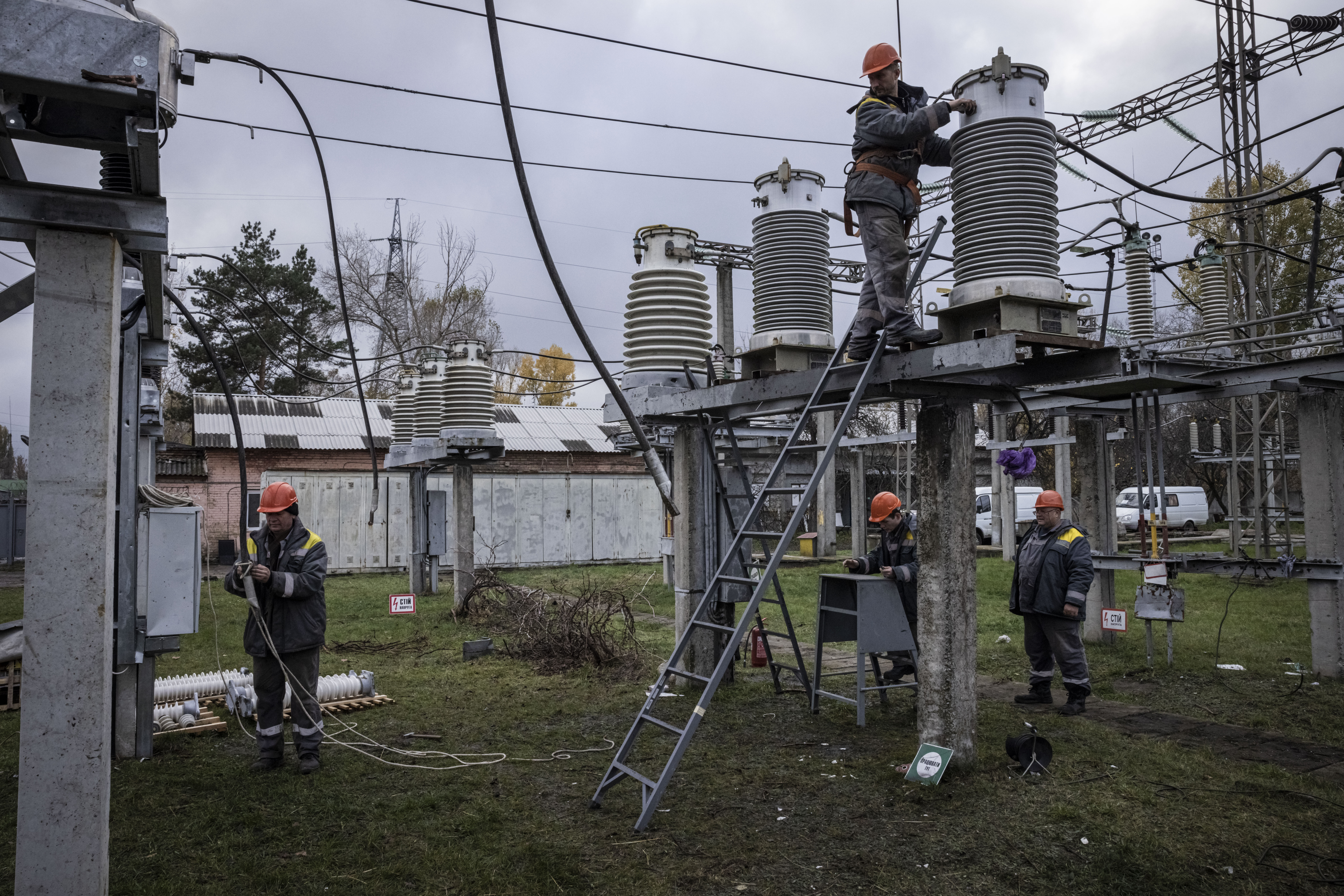 KYIV REGION, UKRAINE - NOVEMBER 04: Workers repair infrastructure in a power station that was damaged by a Russian air attack in October, on November 04, 2022 in Kyiv Oblast, Ukraine. Electricity and heating outages across Ukraine caused by missile and drone strikes to energy infrastructure have added urgency preparations for winter. (Photo by Ed Ram/Getty Images)