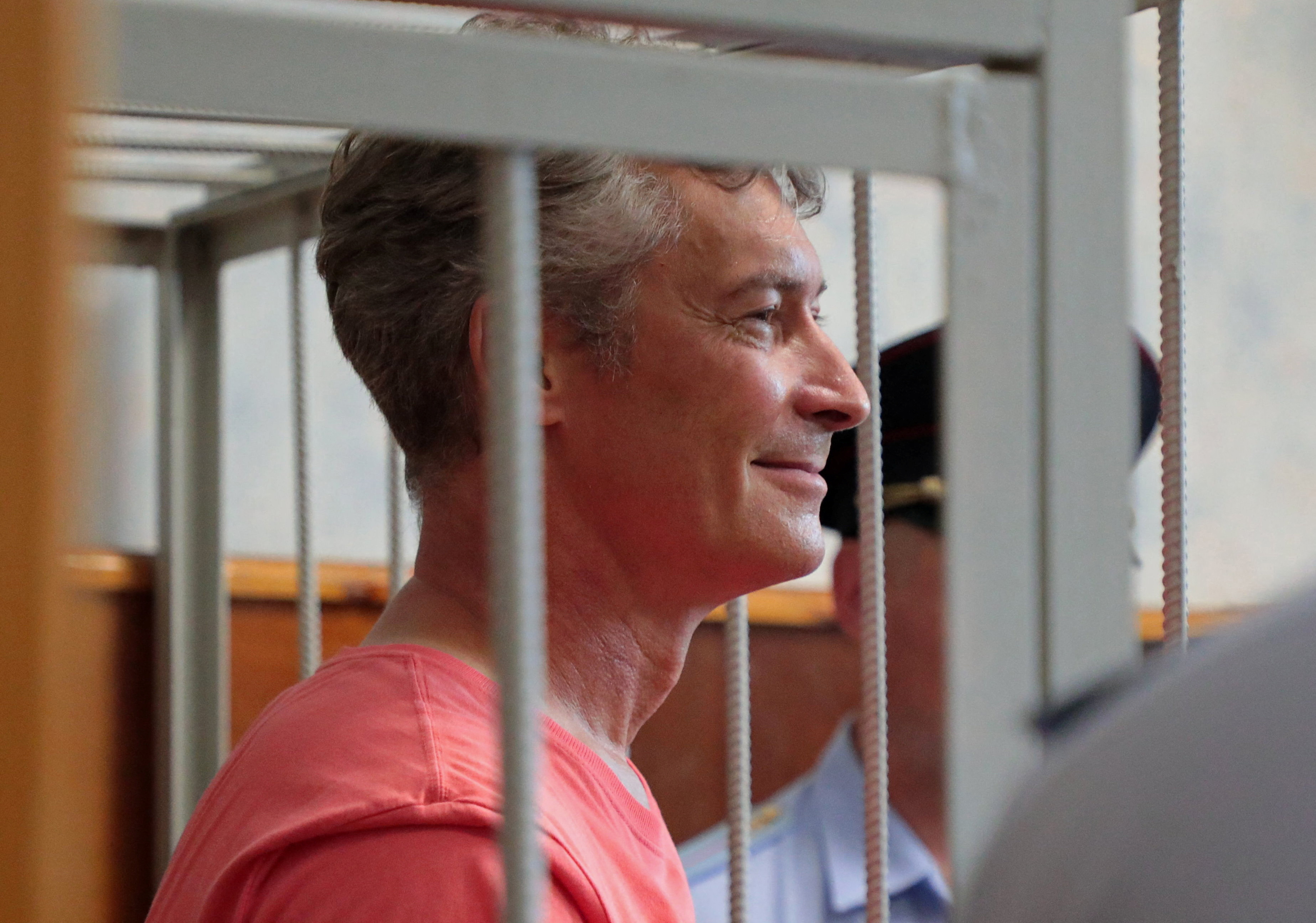Russian opposition politician Yevgeny Roizman, detained and being investigated for criticizing Russia's involvement in the military conflict in Ukraine, stands inside a defendants' cage as he attends a court hearing in Yekaterinburg, Russia August 25, 2022. Natalia Chernokhatova/Octagon.Media via REUTERS ATTENTION EDITORS - THIS IMAGE HAS BEEN SUPPLIED BY A THIRD PARTY.