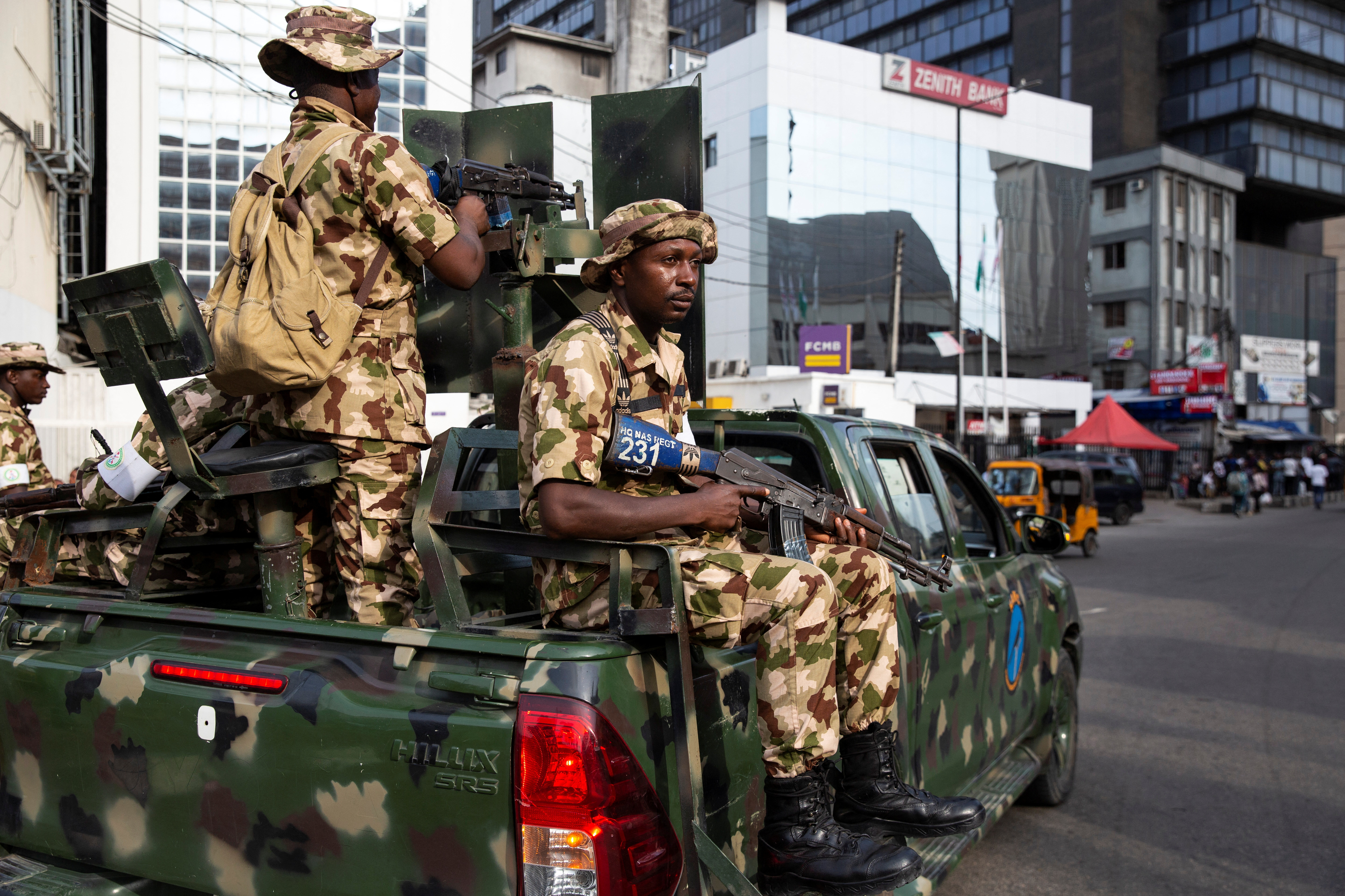 Nigerian soldiers patrol near a market to prevent election-related violence in Lagos Island, Lagos, Nigeria, February 27, 2023. REUTERS/James Oatway.