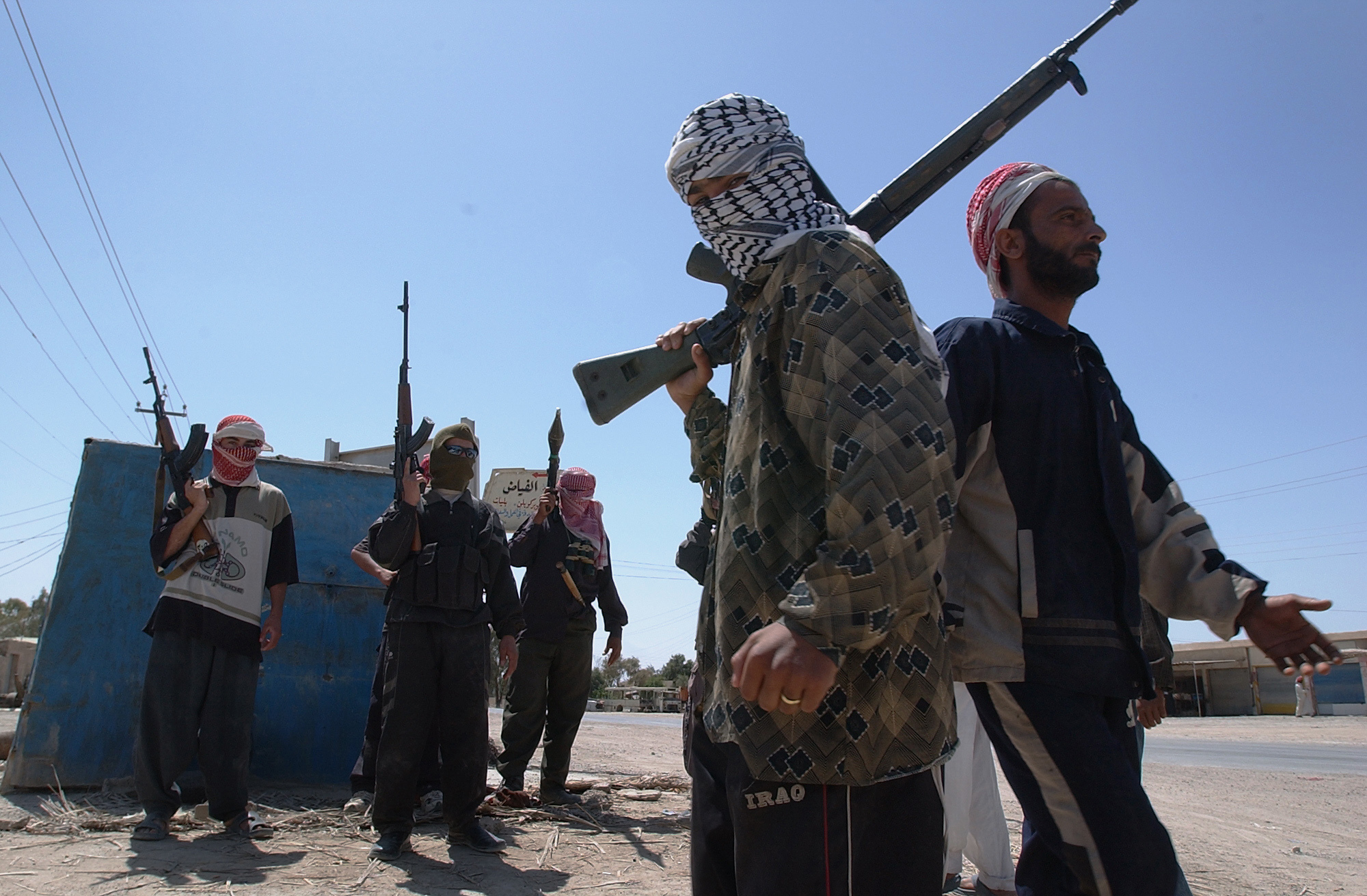 Fighters guarding the streets of Falluja during the US siege of the city 65km west of Baghdad in April 2004