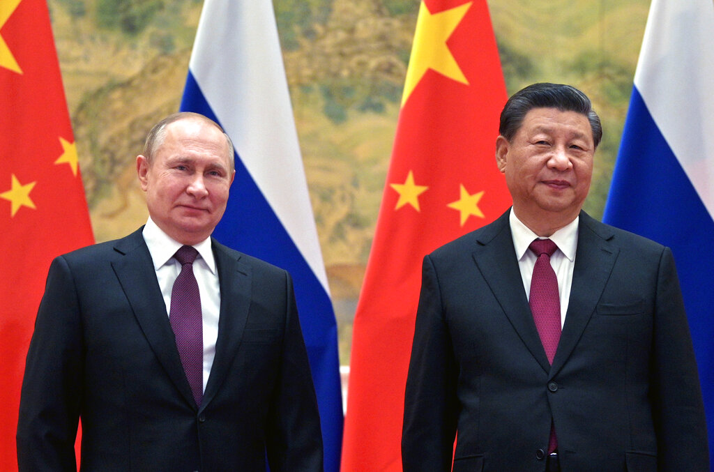 Chinese President Xi Jinping and Russian President Vladimir Putin pose for a photo prior to their talks in Beijing, China, in February 2022, before Russia's invasion of Ukraine.