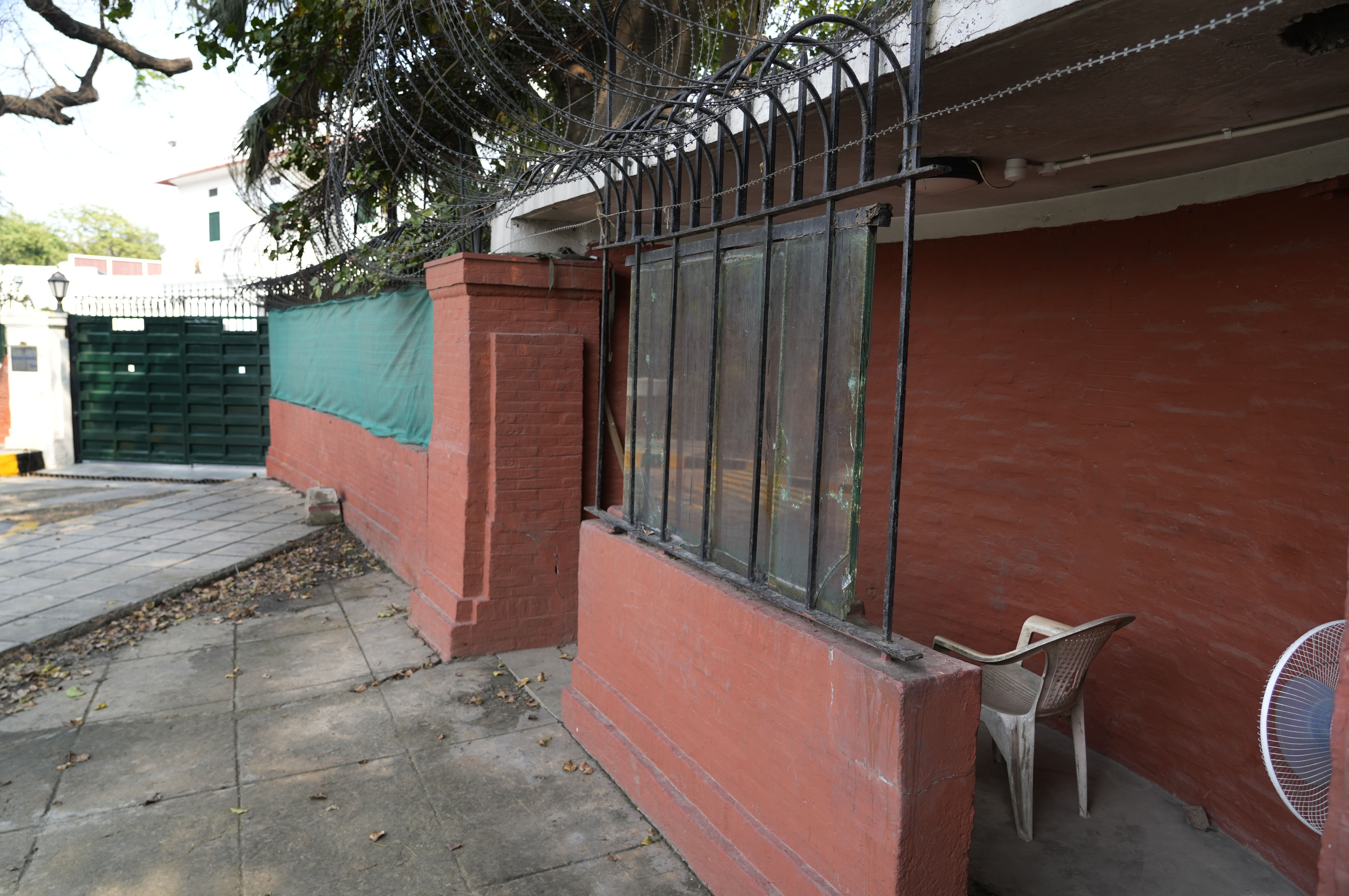 An abandoned security post outside the residence of the British Ambassador after temporary security barricades were removed in New Delhi