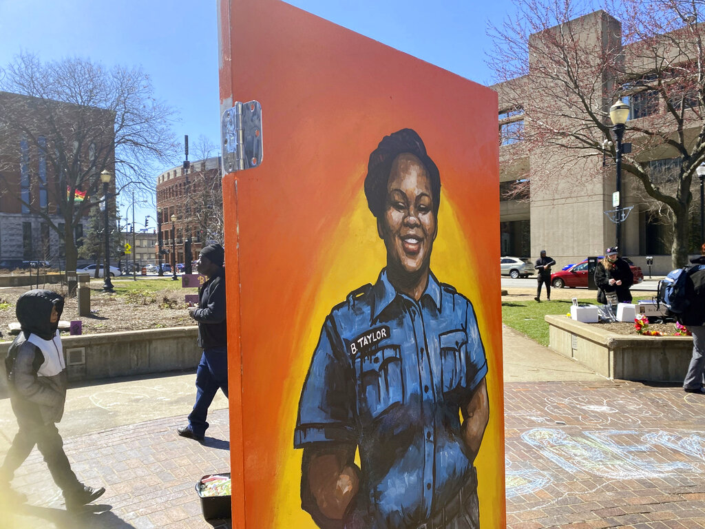 A painting of slain emergency medical technician Breonna Taylor