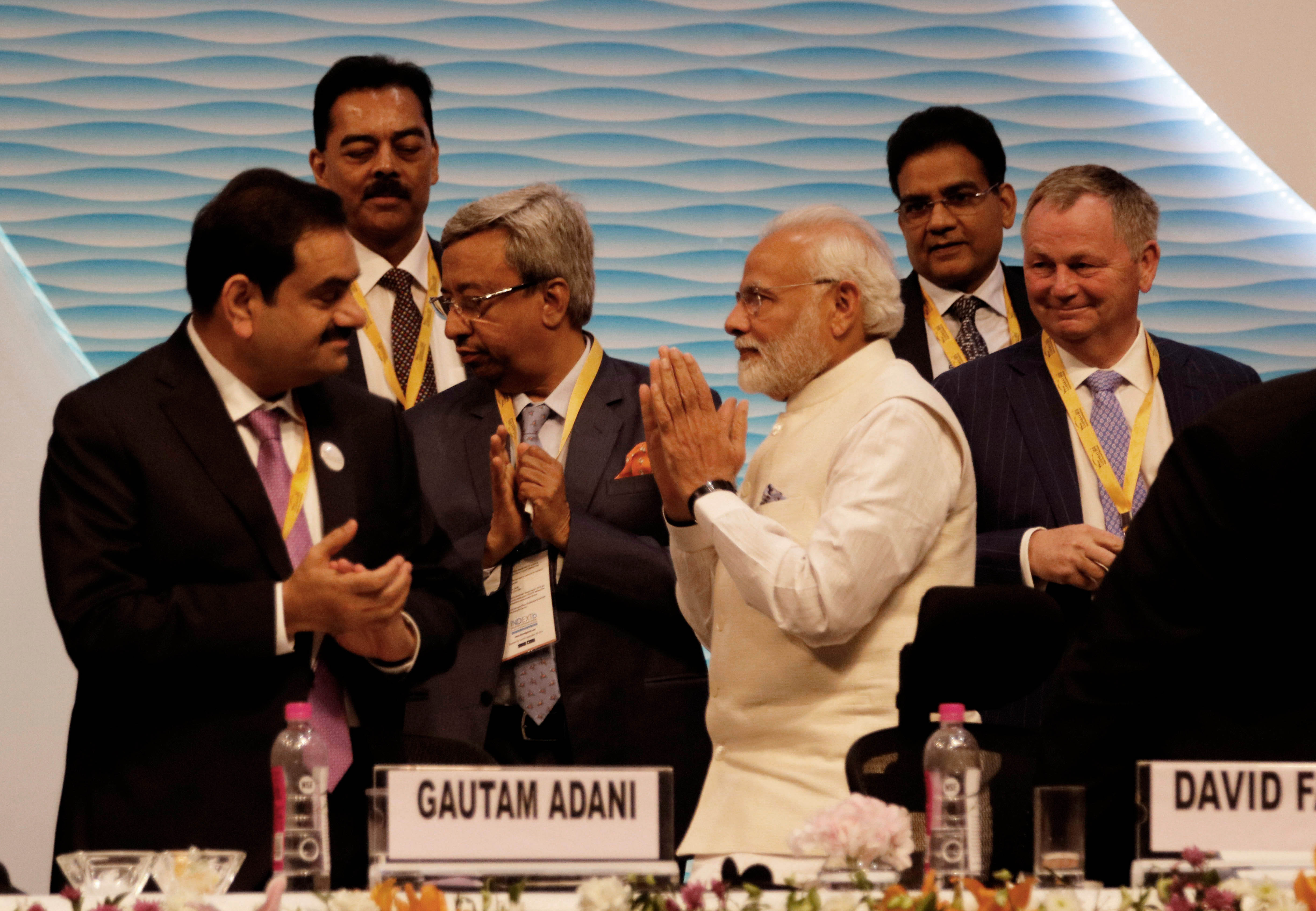 Prime Minister Narendra Modi with Gautam Adani, chairman and founder of the Adani Group, and other delegates at Vibrant Gujarat Global Summit, at Mahatma Mandir Exhibition cum Convention Centre, on January 18, 2019 in Gandhinagar, India