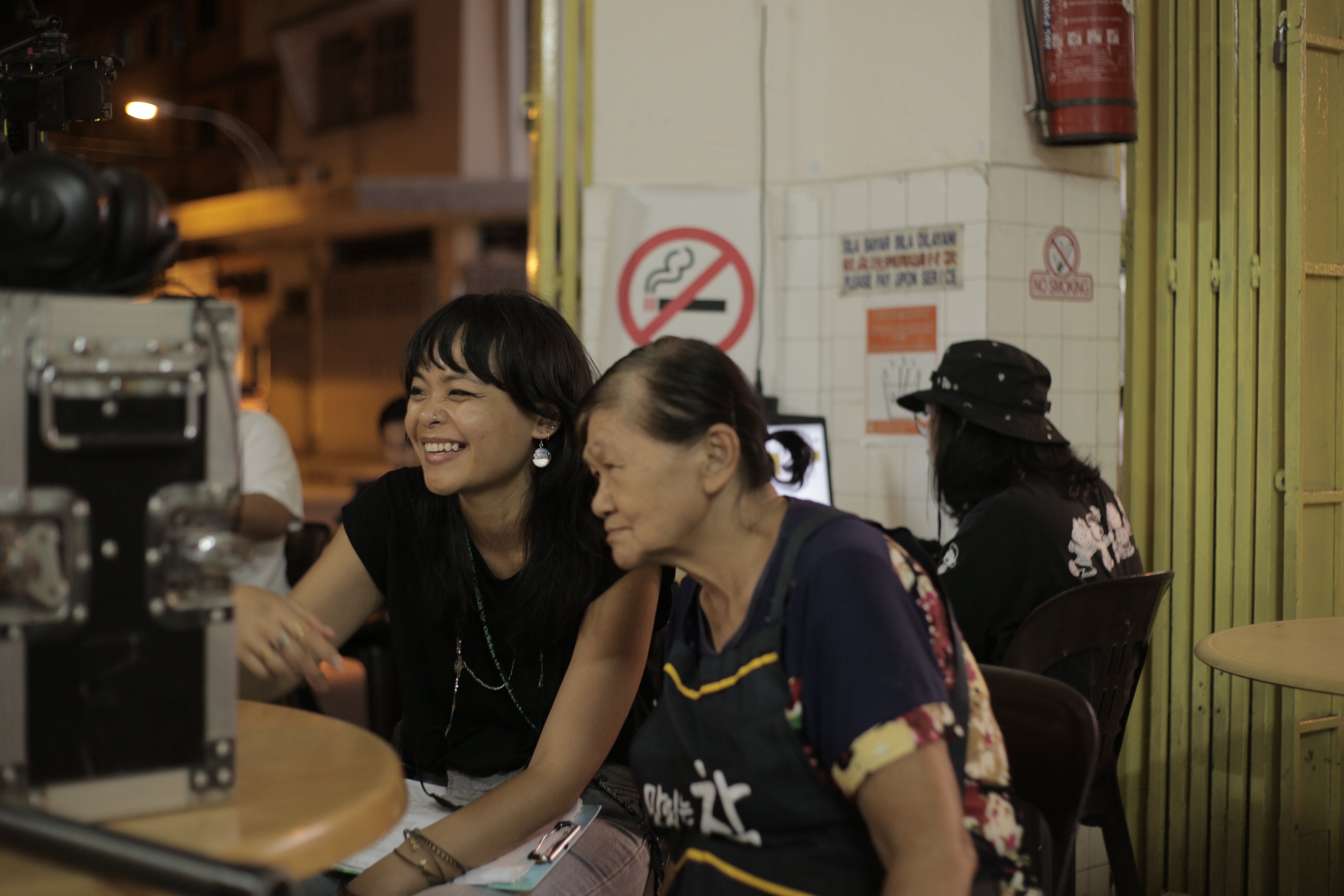 Director Nadira Ilana pictured on a film set with actress Kim Xiao.