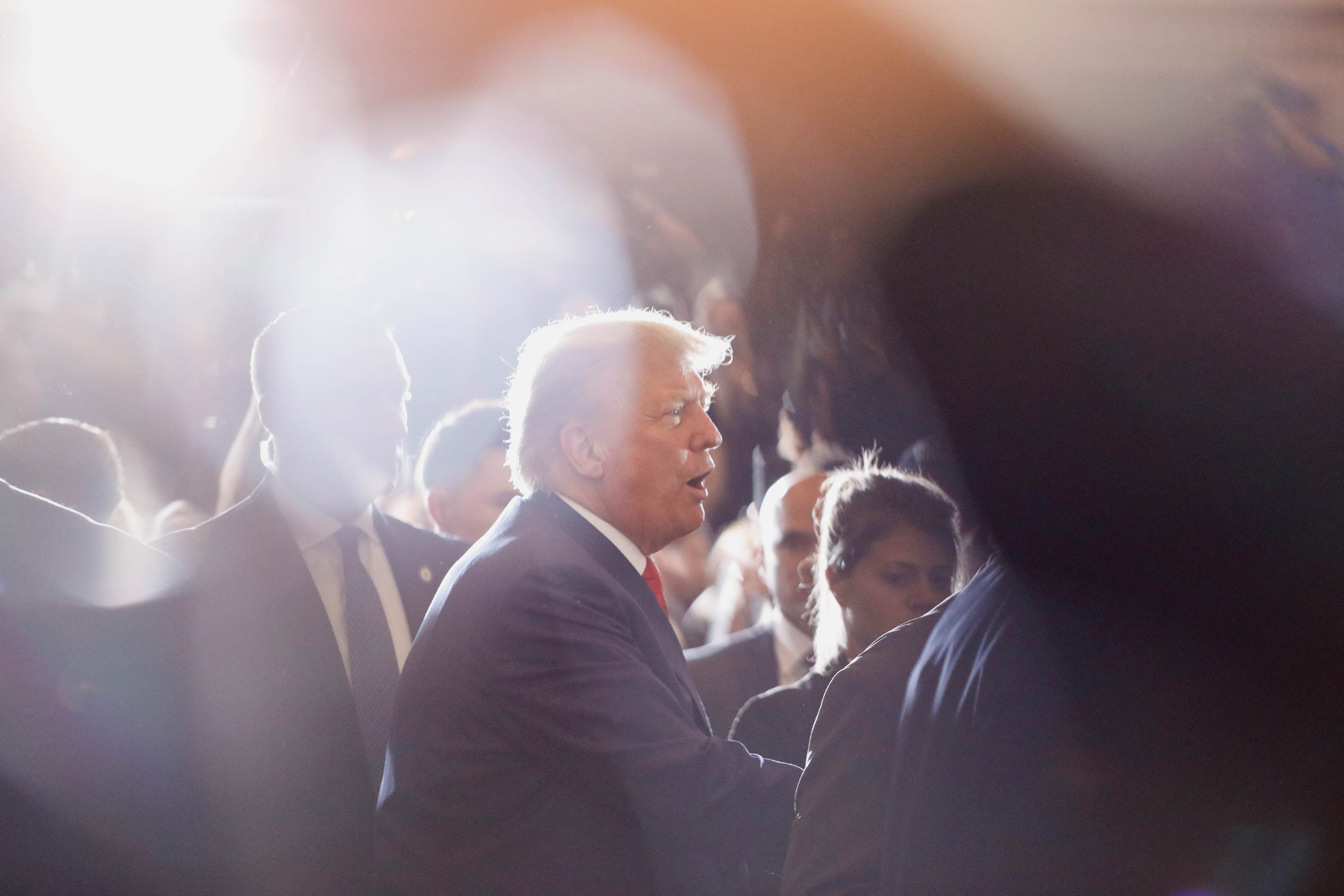 Trump seen through a lens with bokeh