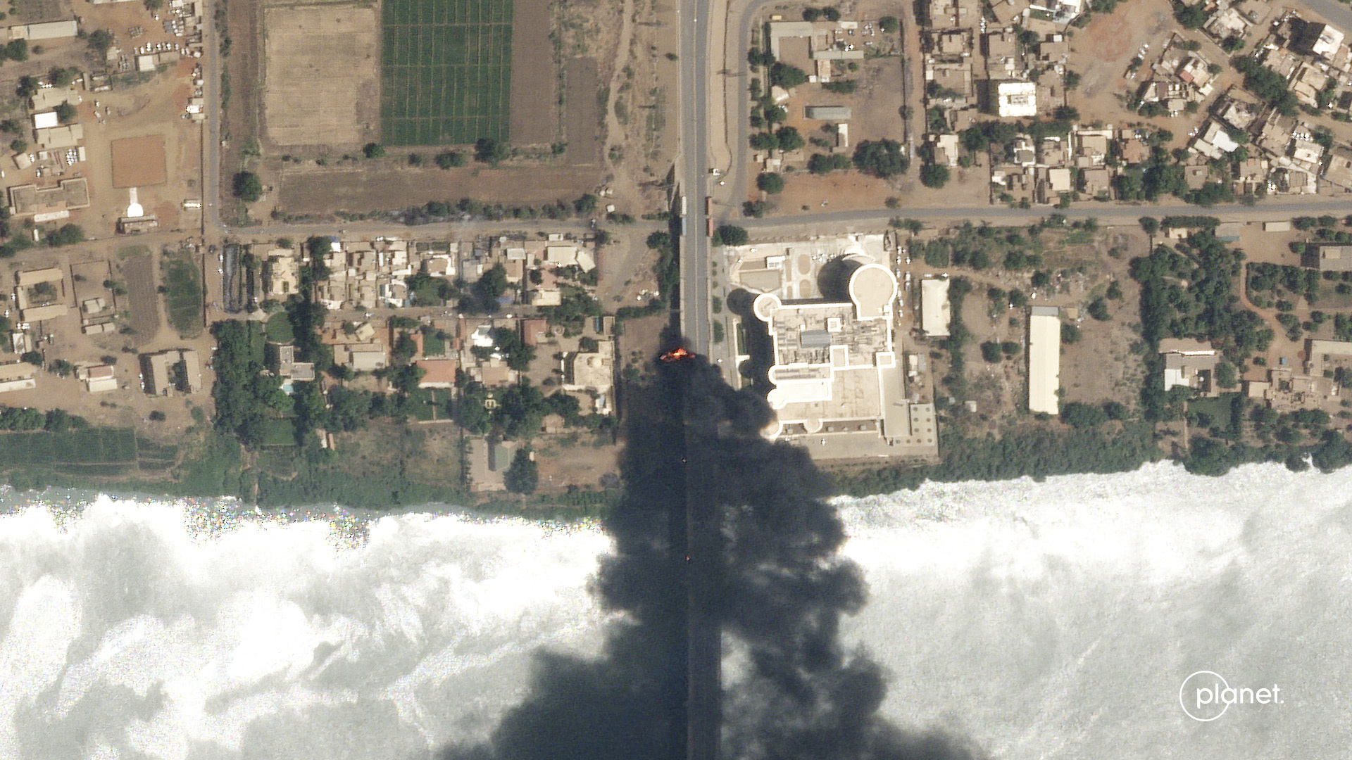 satellite photo by Planet Labs PBC shows fires burning near a hospital in Khartoum,