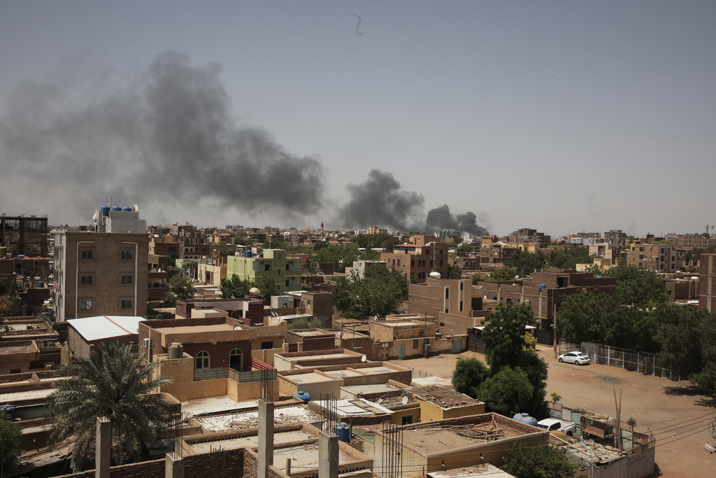 Smoke rises in Khartoum