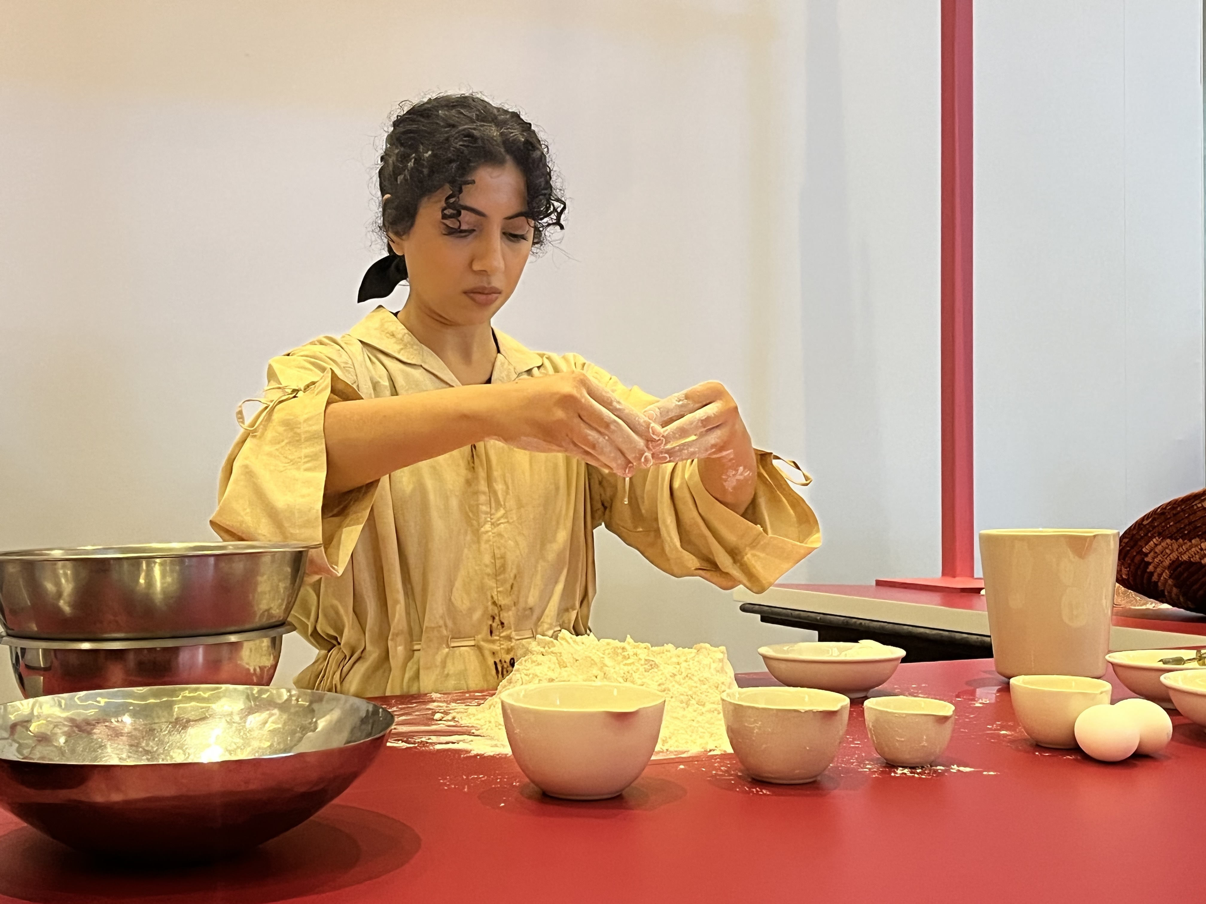 Almatrooshi during her performance 'The Alphabetics of the Baker' at Art Dubai