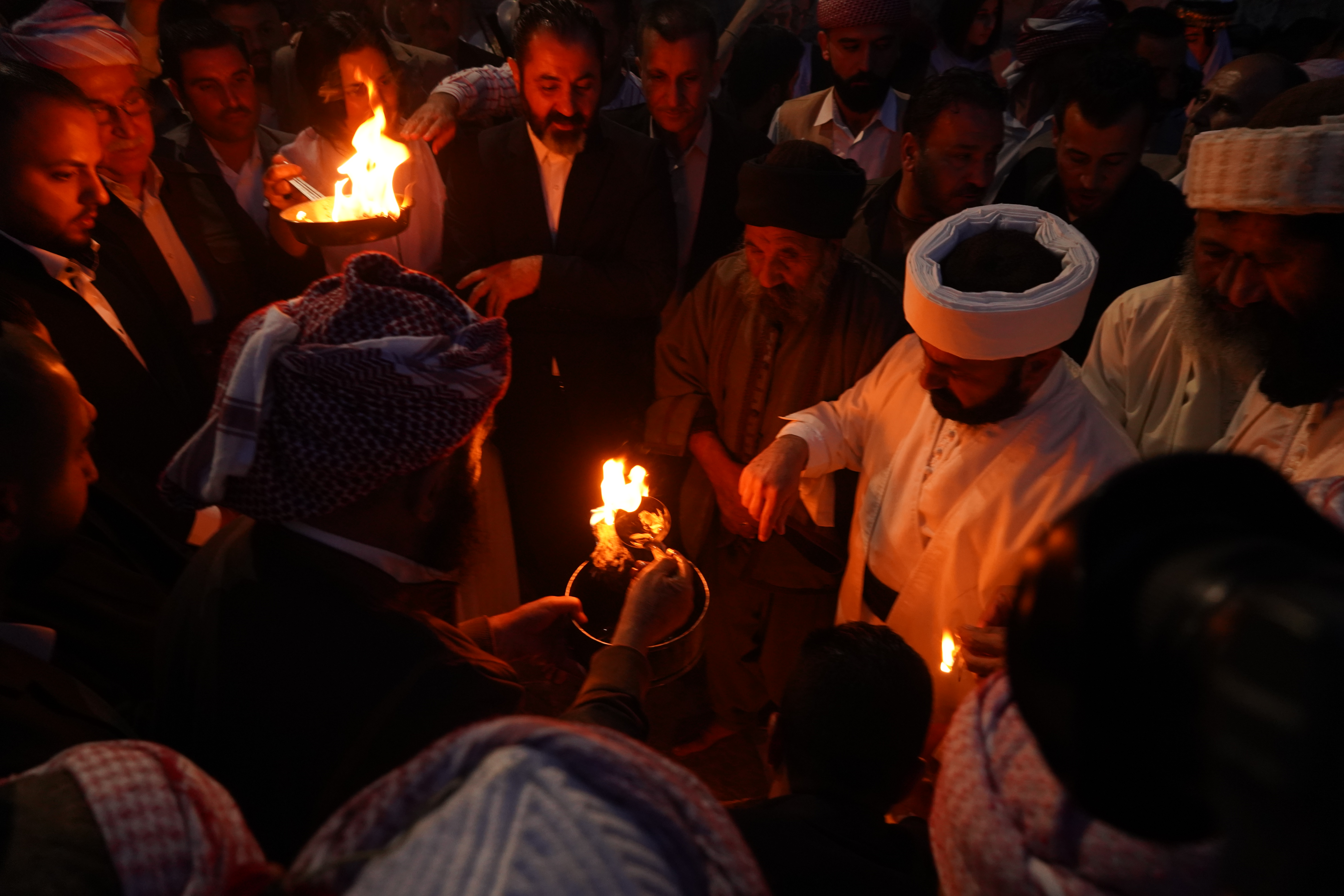 Yazidi New Year's Eve celebrations at Lalish Temple in the Kurdistan Region of Iraq [Ismael Adnan/Al Jazeera]