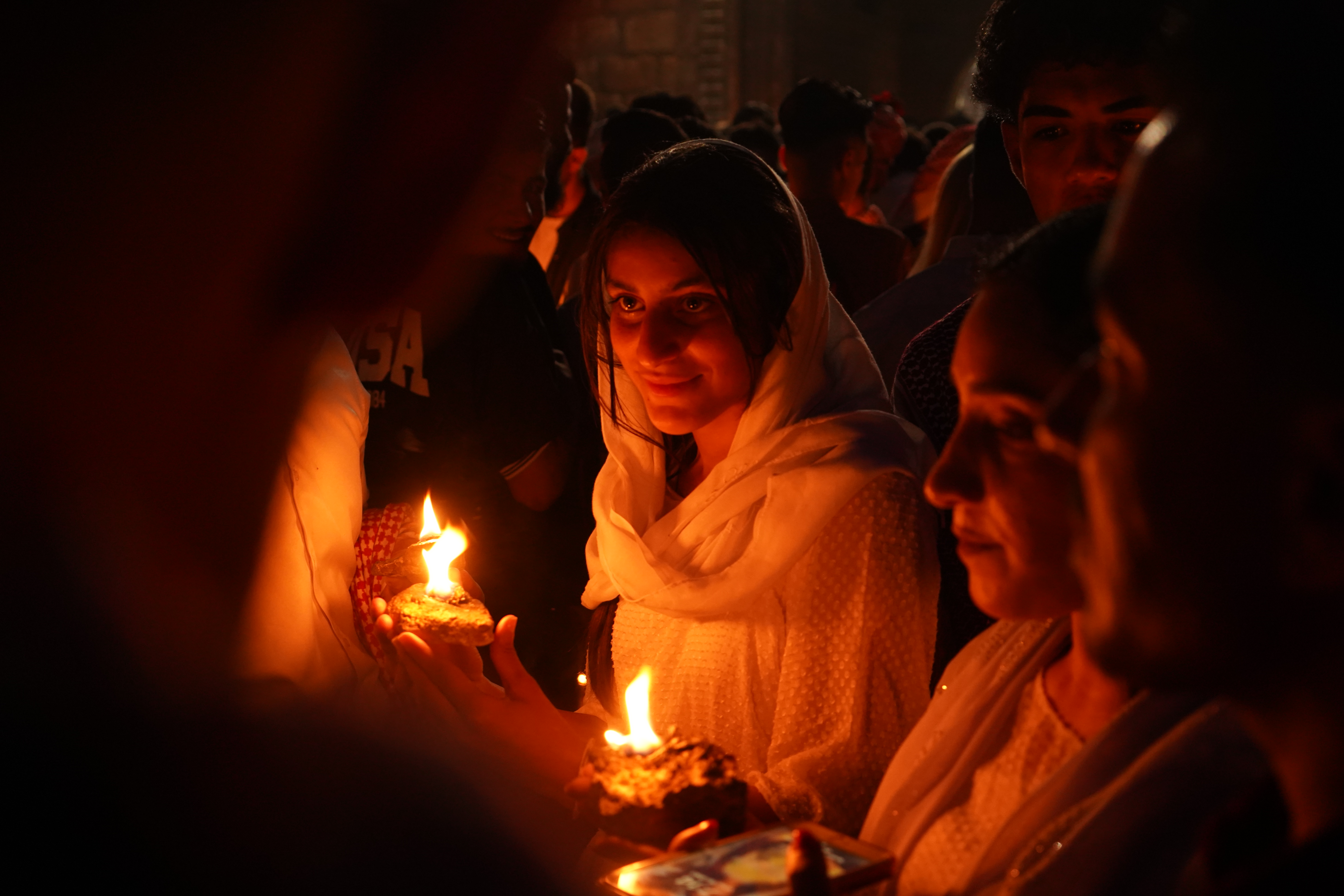 Yazidi New Year's Eve celebrations at Lalish Temple in the Kurdistan Region of Iraq [Ismael Adnan/Al Jazeera]