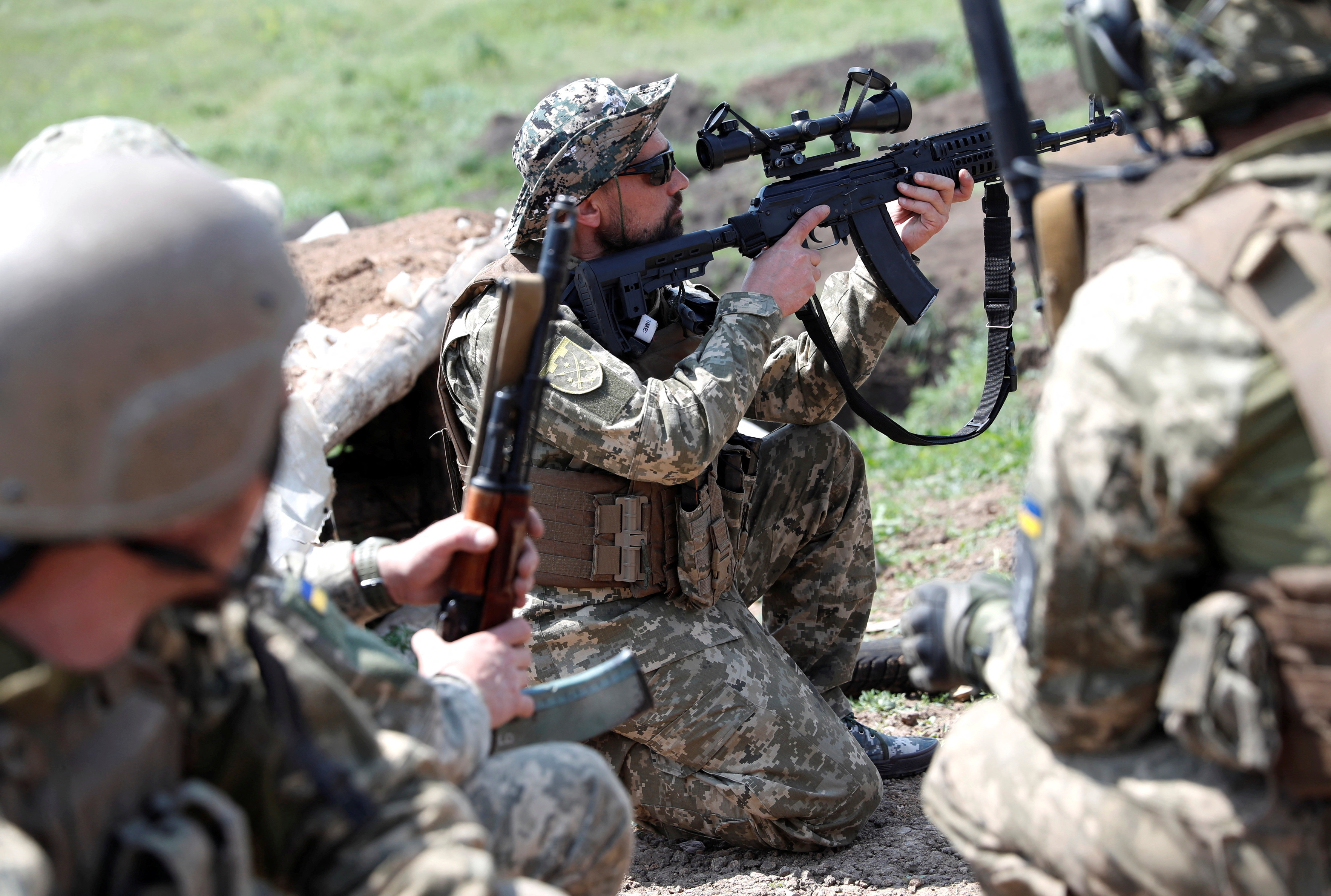 A Ukrainian serviceman of the 128th territorial defence brigade attends a military training, amid Russia's attack on Ukraine, in Donetsk region, Ukraine, May 18, 2023. REUTERS/Bernadett Szabo