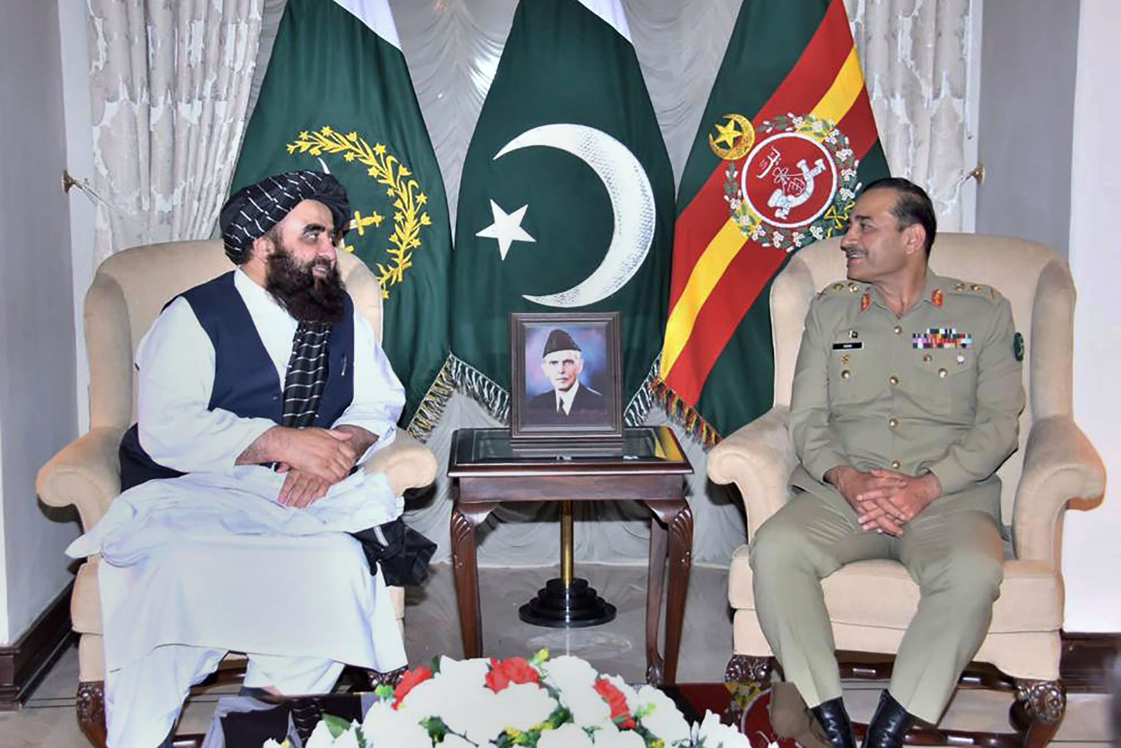 the Taliban-appointed Afghan Foreign Minister Amir Khan Muttaqi, left, meets with Pakistan's Army Chief General Asim Munir, in Rawalpindi,