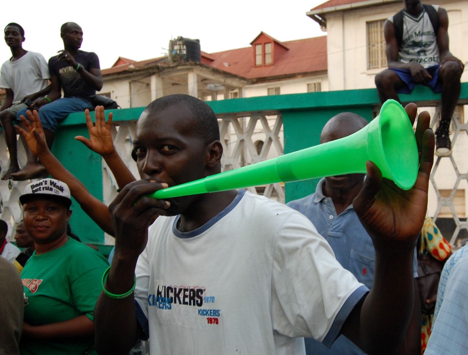 People celebrate the victory of Julius Maada Bio as new president of Sierra Leone on April 4, 2018 in Freetown, Sierra Leone