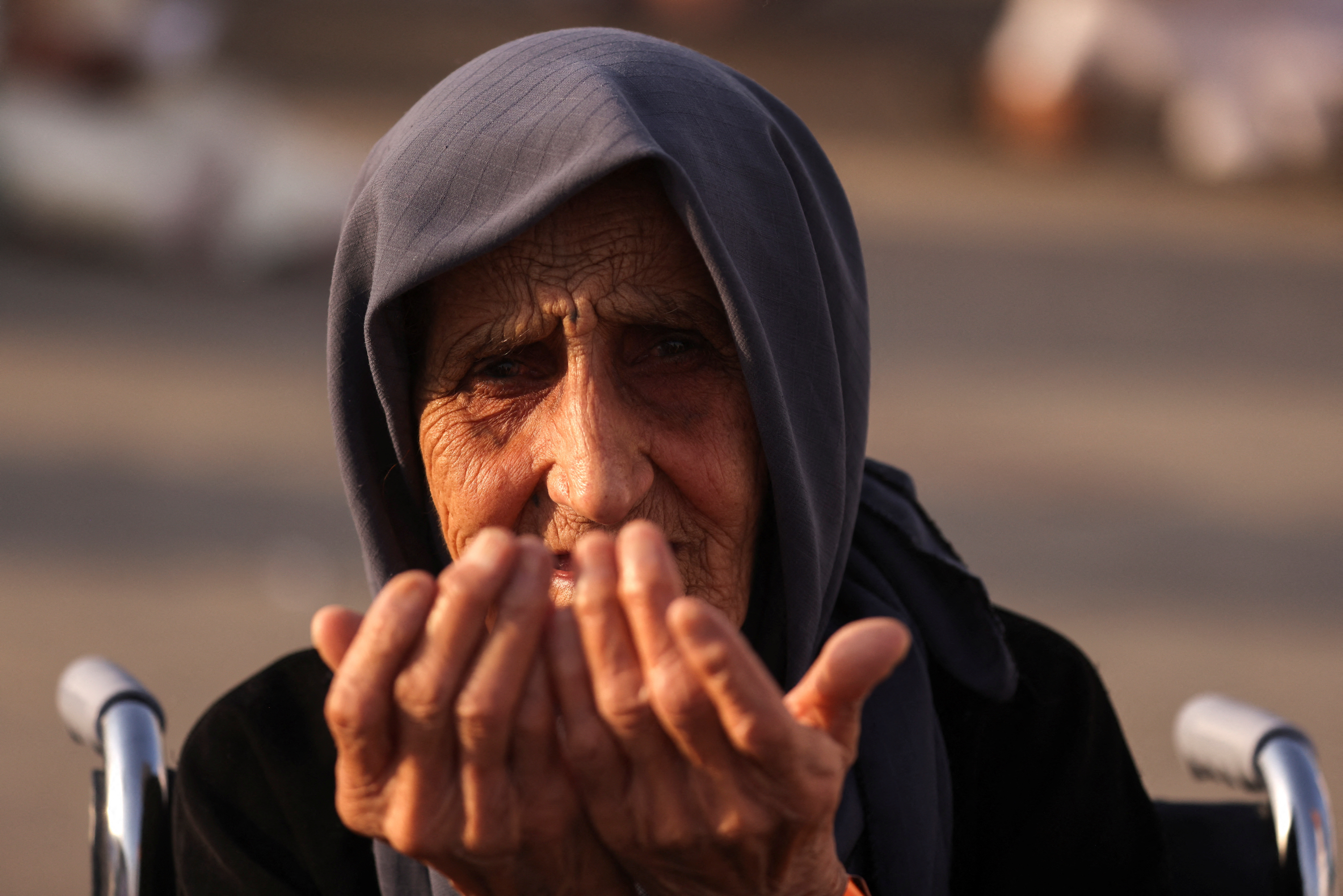 A Muslim pilgrim prays on the Mount of Mercy at the plain of Arafat during the annual haj pilgrimage
