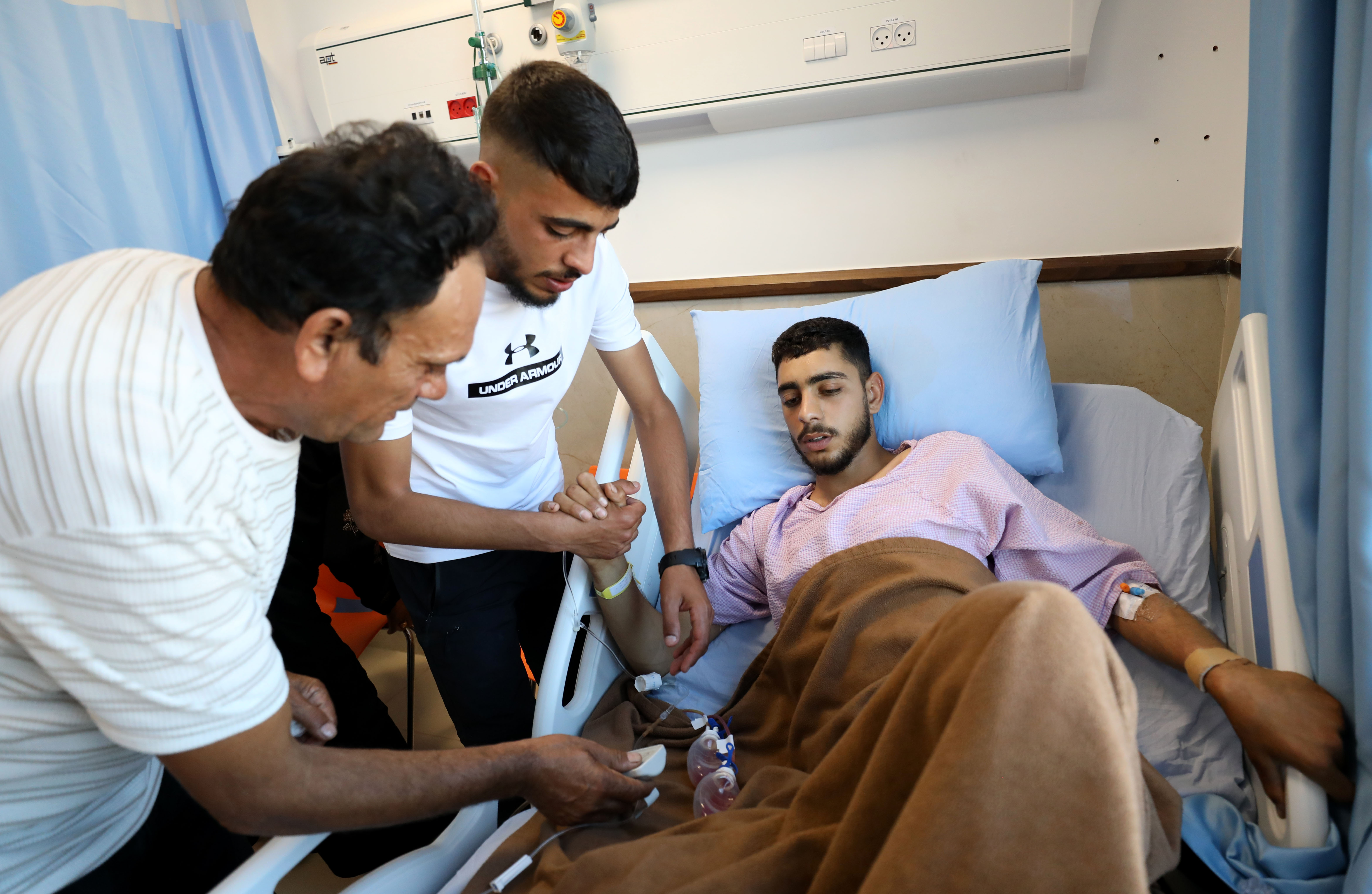 An injured man with his family