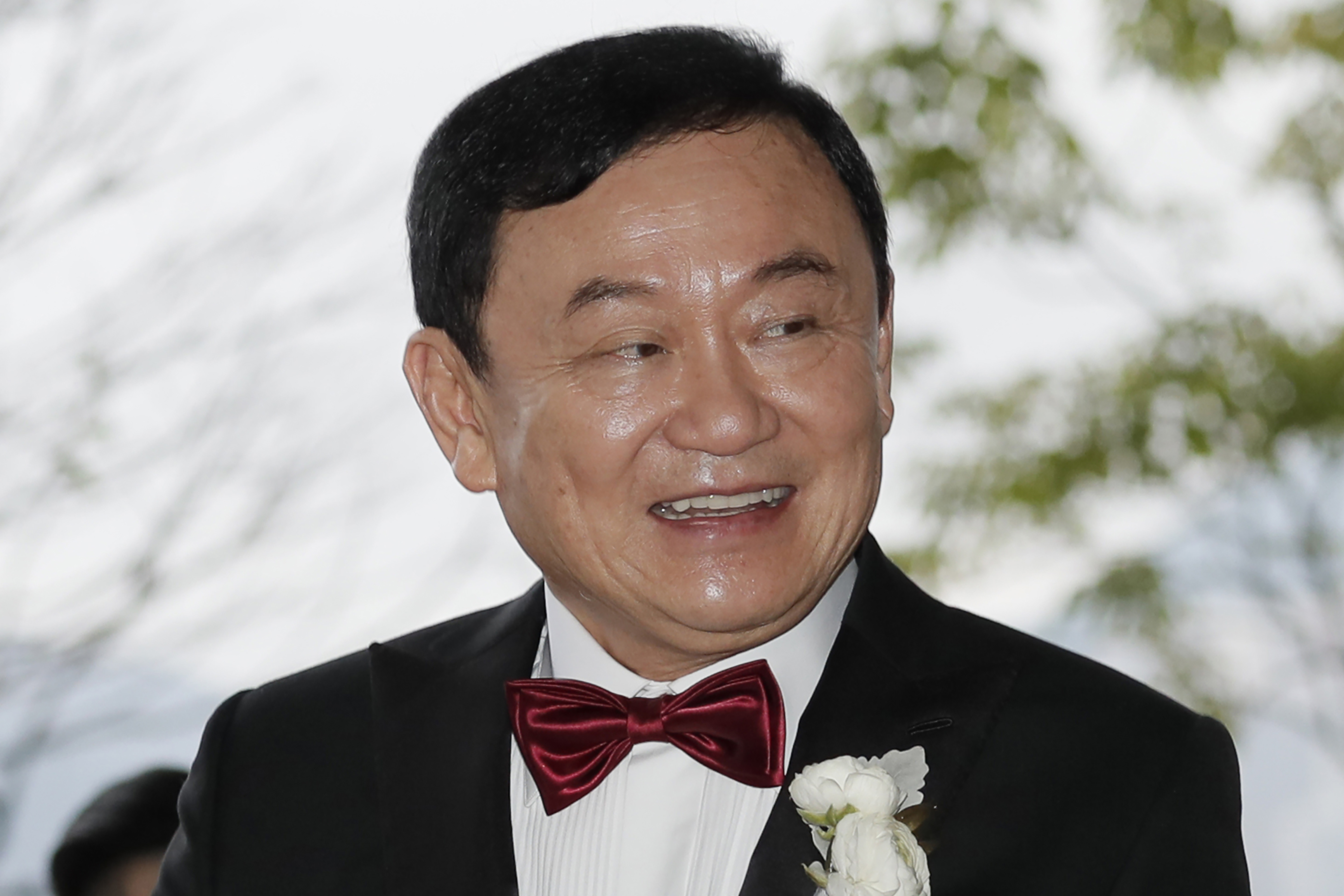 Former Thai Prime Minister Thaksin Shinawatra welcomes his guests for the wedding of his youngest daughter Paetongtarn "Ing" Shinawatra at a hotel in Hong Kong on March 22, 2019.