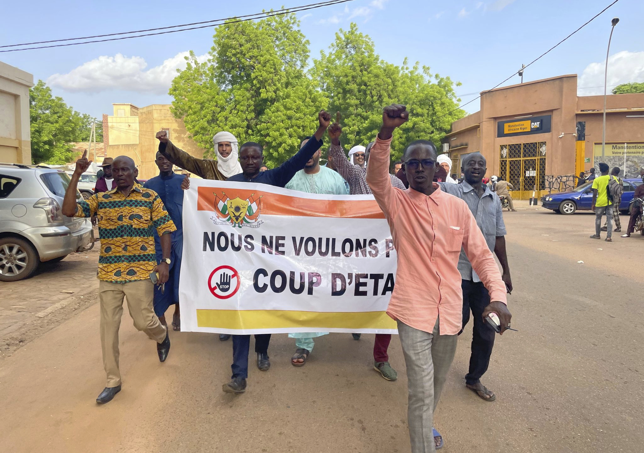 Supporters of Nigerien President Mohamed Bazoum demonstrate in his support in Niamey, Niger, Wednesday July 26, 2023