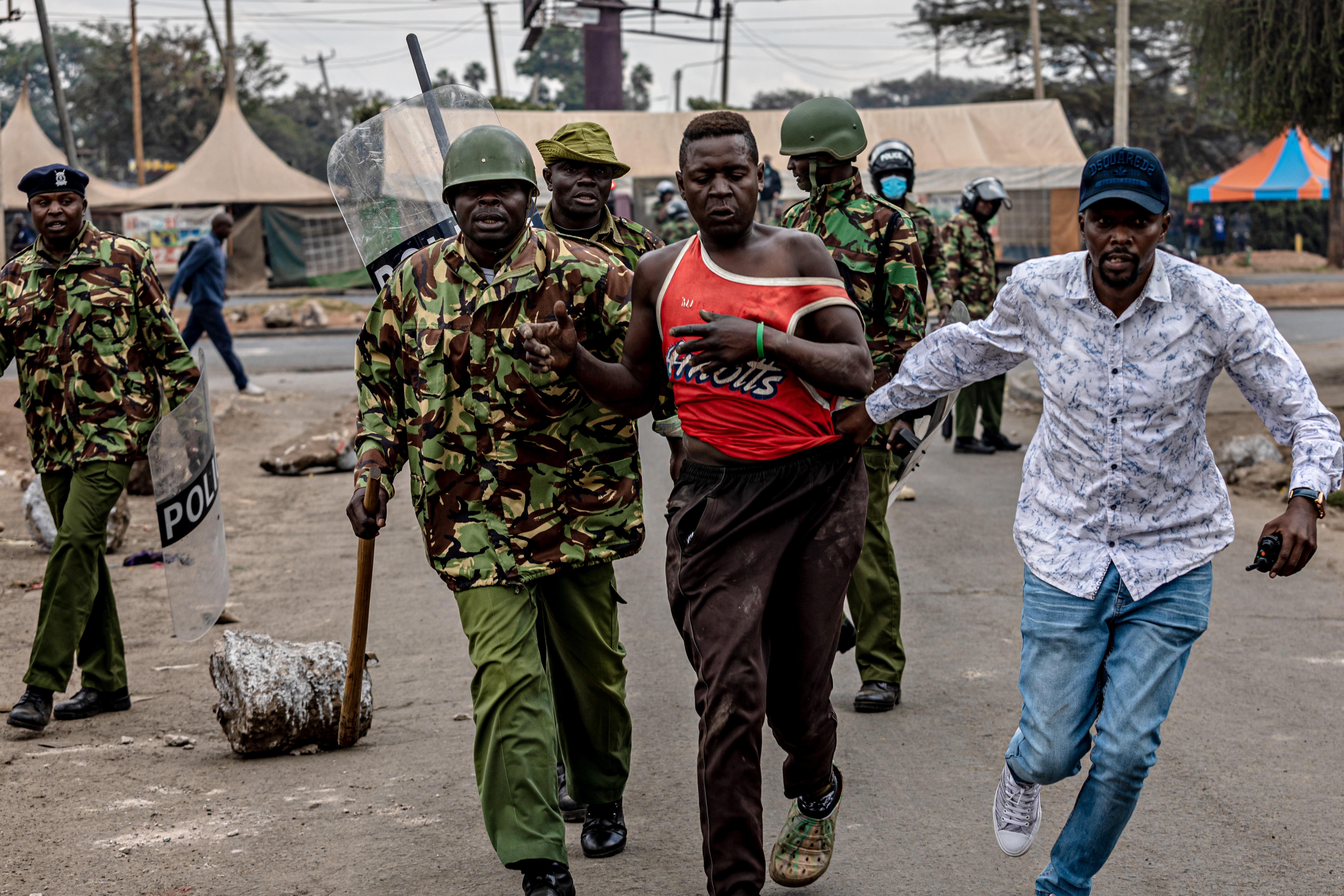 kenya14: A protester who had been seen pulling down road signs and destroying public property is arrested at Shauri Moyo.