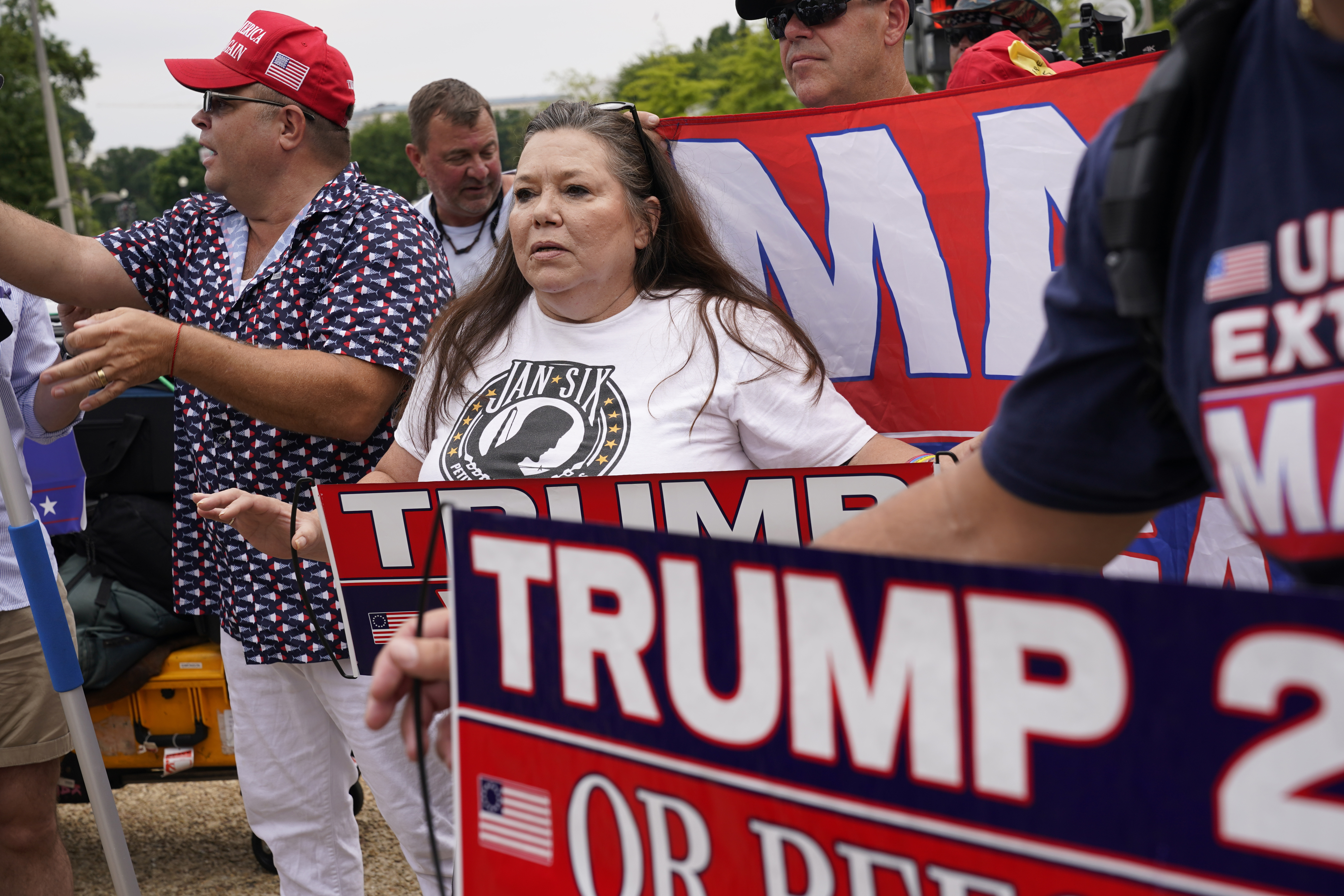 Supporters of Former President Donald Trump gather at the E. Barrett Prettyman U.S. Federal Courthouse