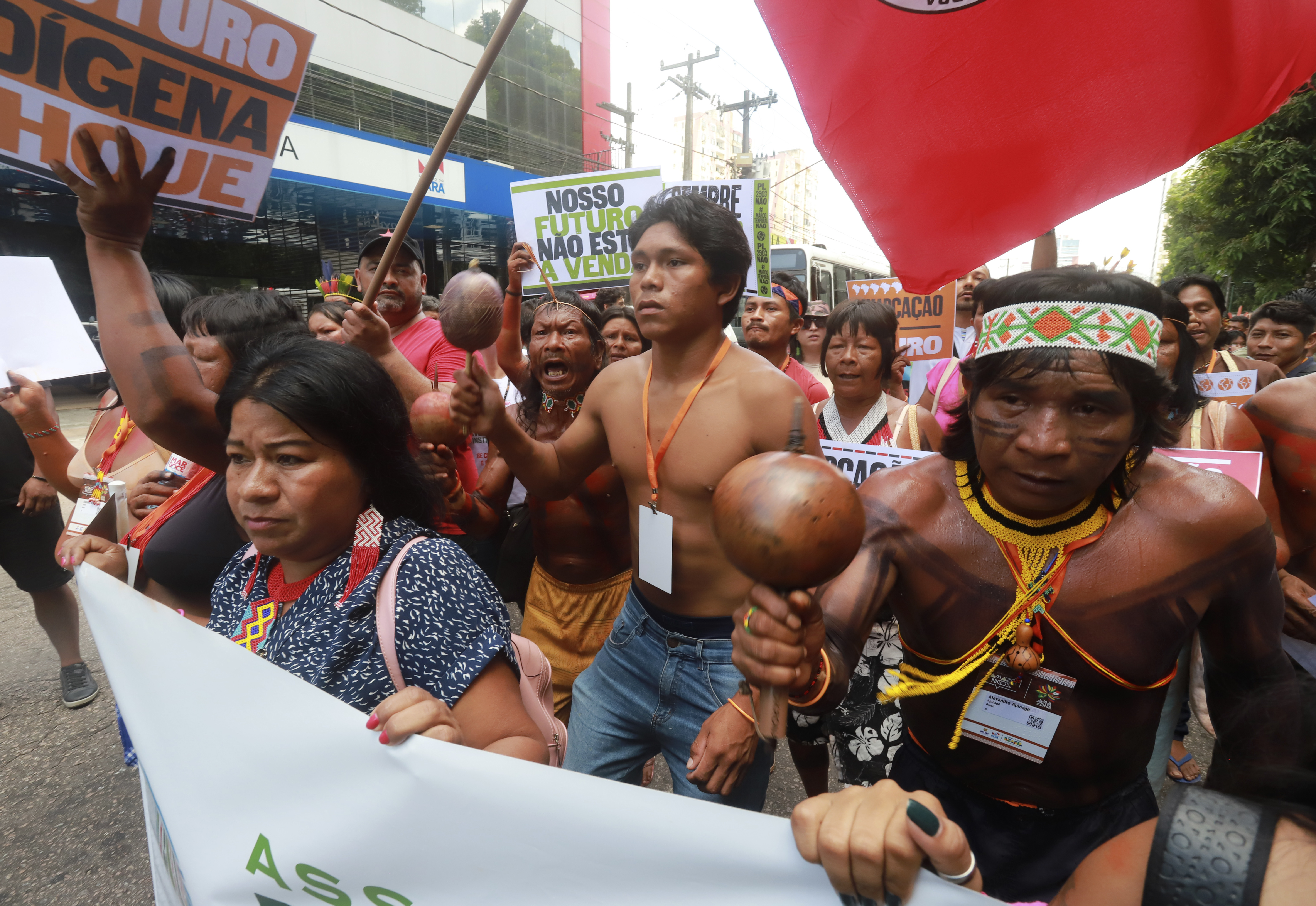 Indigenous people march in defense of the Amazon in Belem, Brazil, Tuesday, Aug. 8, 2023. Belem is hosting the Amazon Cooperation Treaty Organization that is meeting to chart a common course for protection of the bioregion and address organized crime. (AP Photo/Paulo Santos)