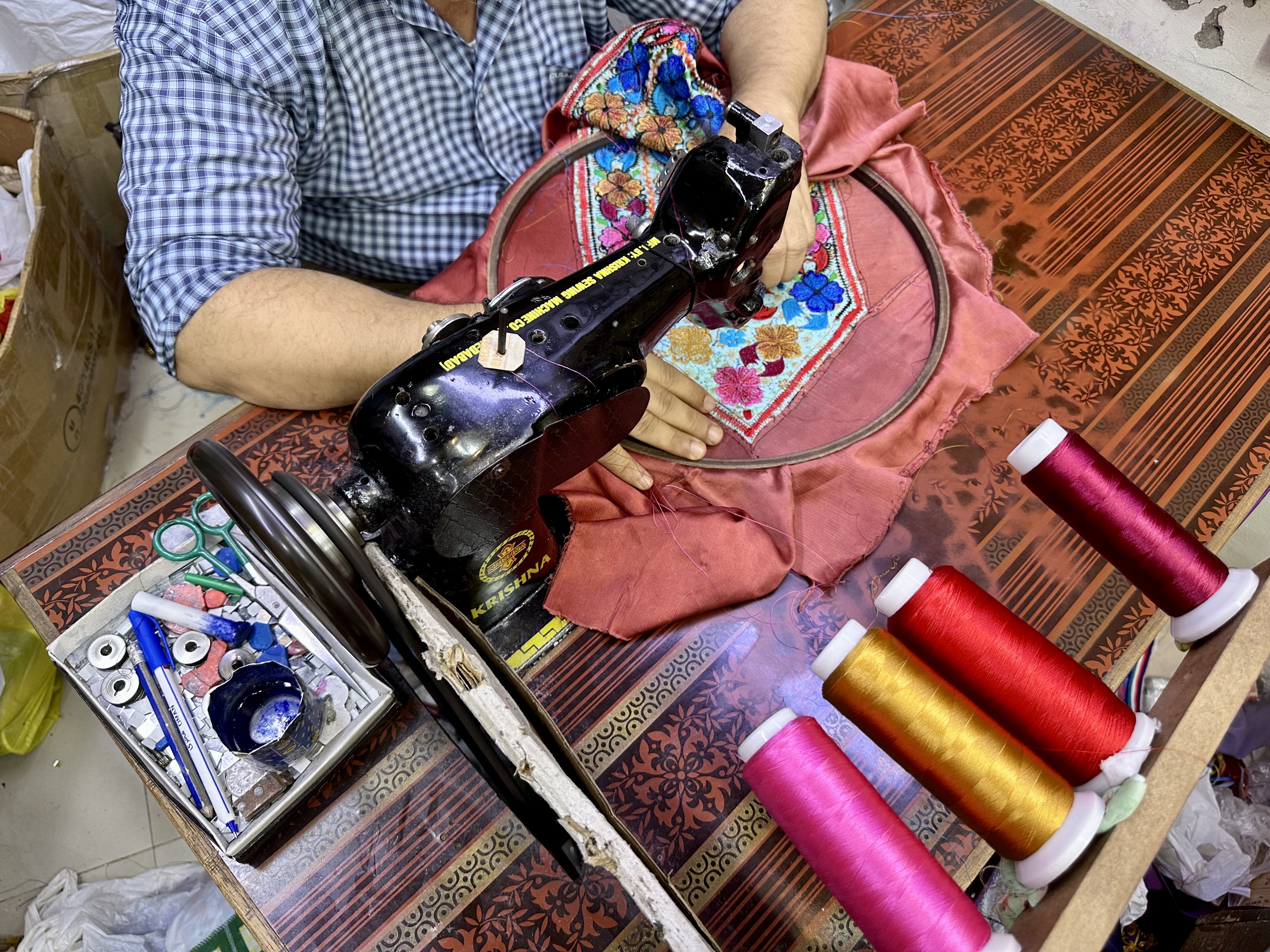 Patel sews Baluchi designs with his sewing machine