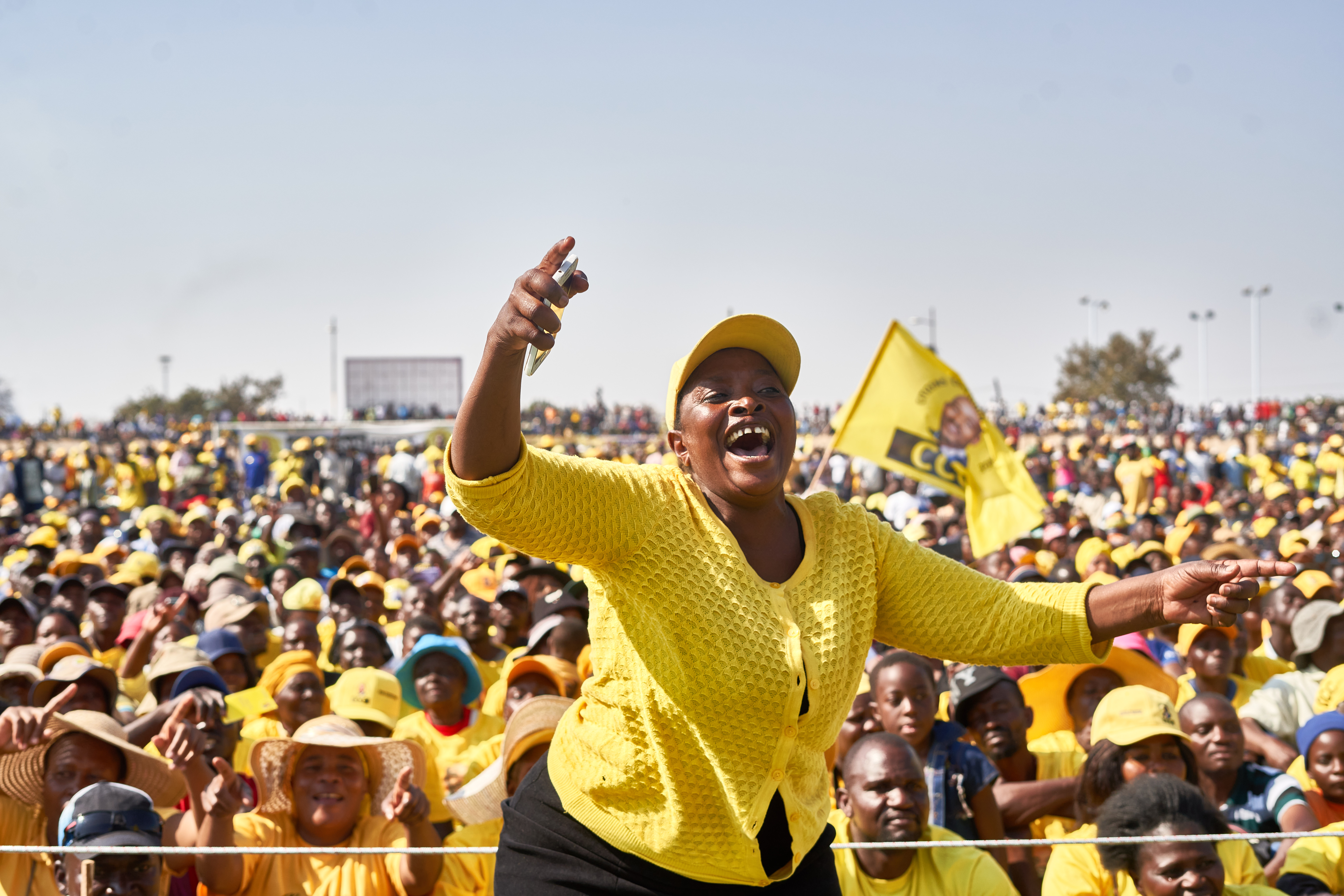 An supporter of Zimbabwe's main opposition party, Citizen’s Coalition for Change (CCC), raises her finger, the party symbol, at a rally addressed by presidential hopeful Nelson Chamisa, at White City Stadium in Bulawayo, Zimbabwe on August 19, 2023 [