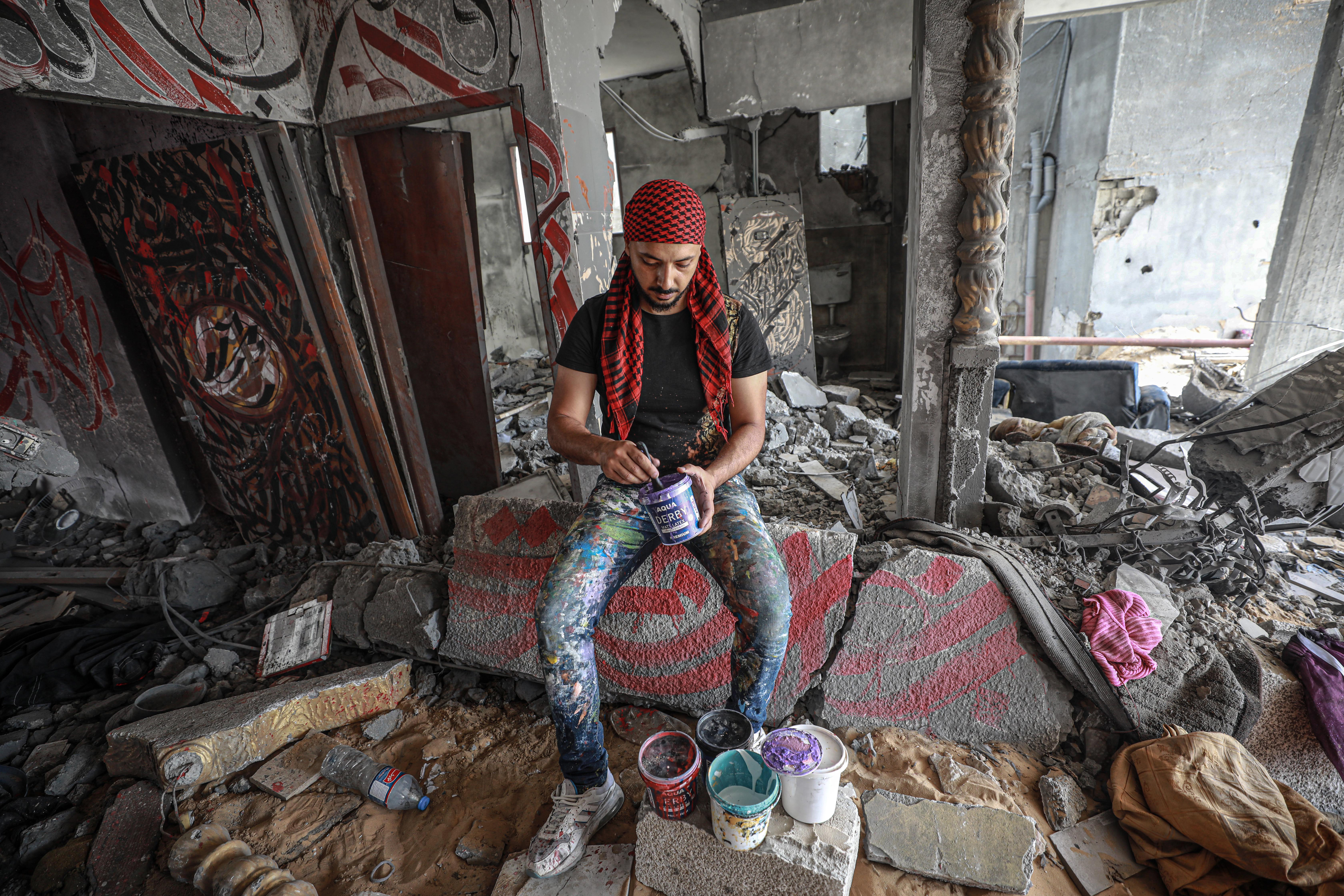 Ayman Hosari sitting on a wall