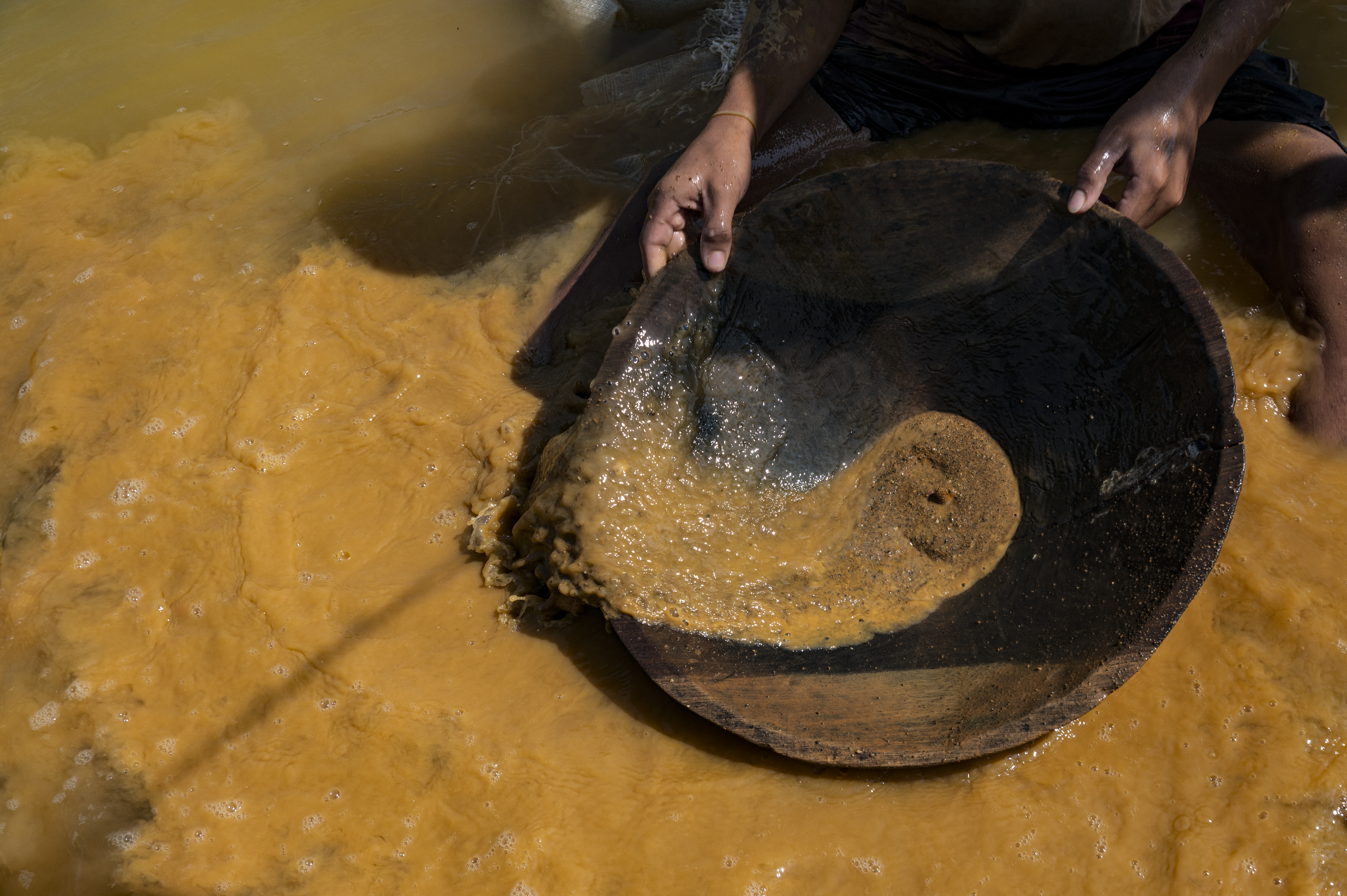Gold and mercury, not books, for Venezuela's child miners