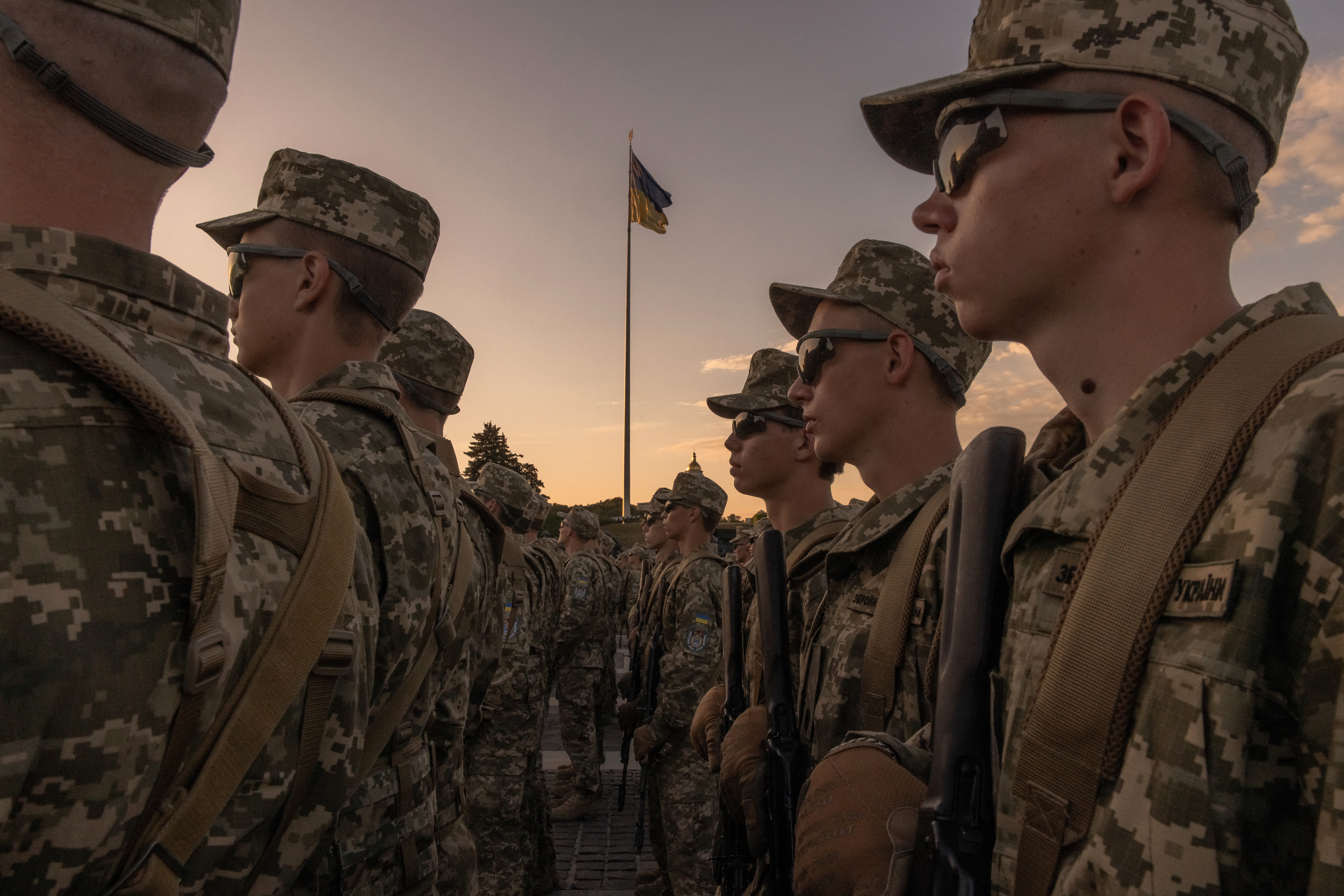 Young soldiers lined up in their uniforms after enlisting for the Ukrianian armed forces