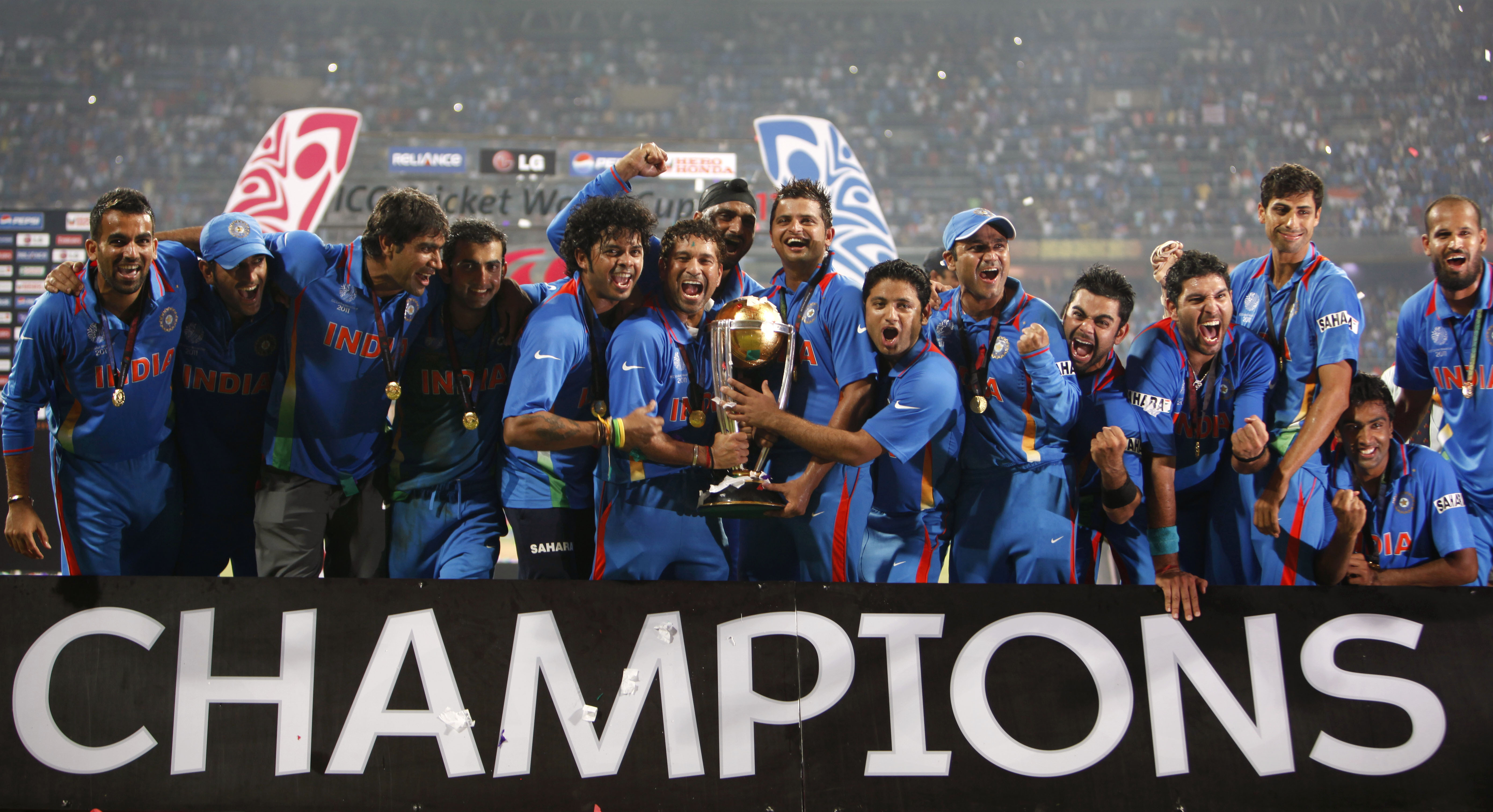 Indian cricketers celebrate their win
