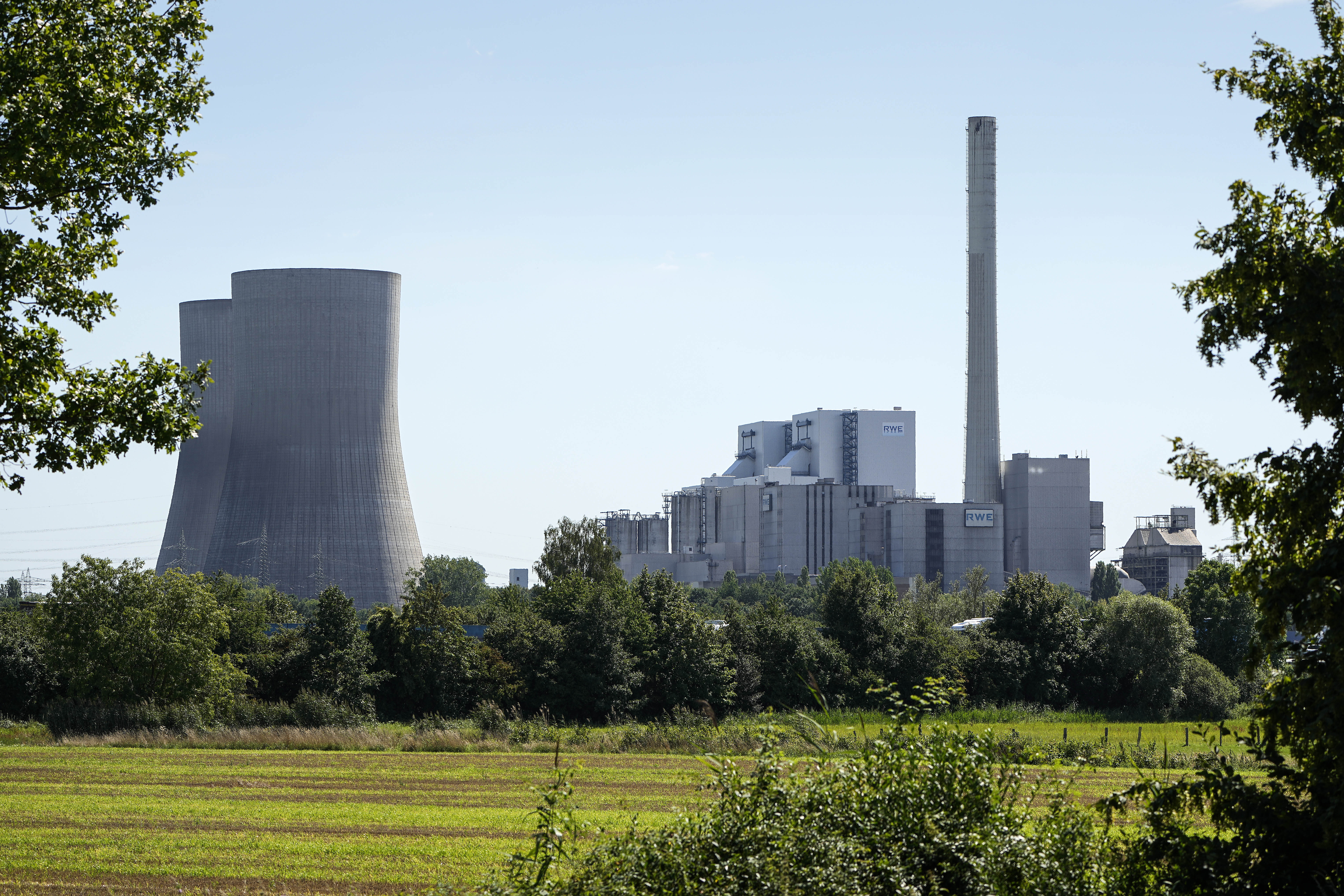 The shut down coal-fired power plant Westfalen of RWE Generation SE is seen behind a fence in Hamm, Germany, Thursday, Aug. 10, 2023. The power plant was taken off the grid two years ago before the energy crisis as part of the nationwide decommissioning auction for hard coal-fired power plants. Germany focus on decarbonization and renewable energy to fight climate change. (AP Photo/Martin Meissner)