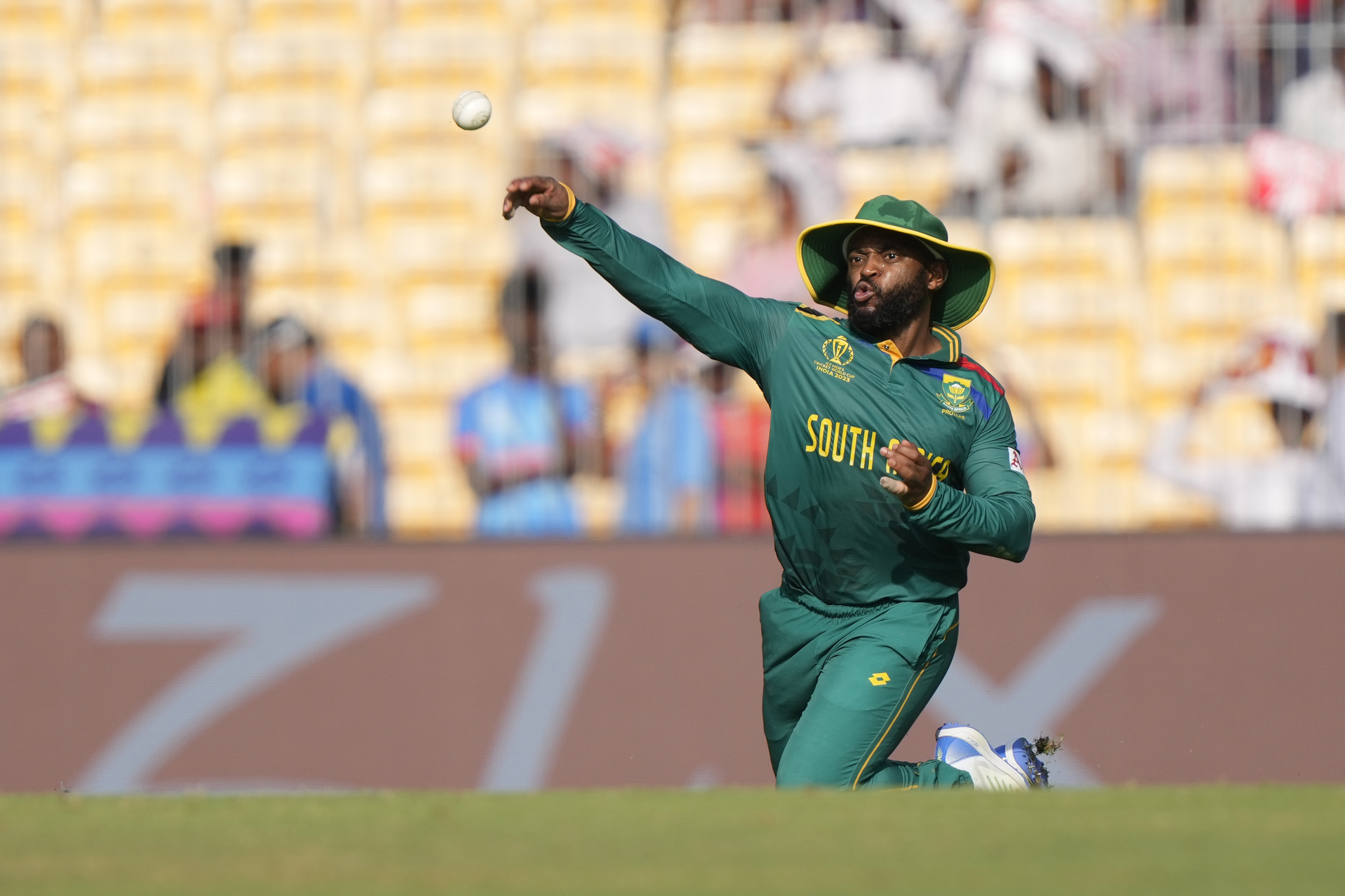 South Africa's captain Temba Bavuma fields the ball during the ICC Men's Cricket World Cup match between South Africa and Pakistan