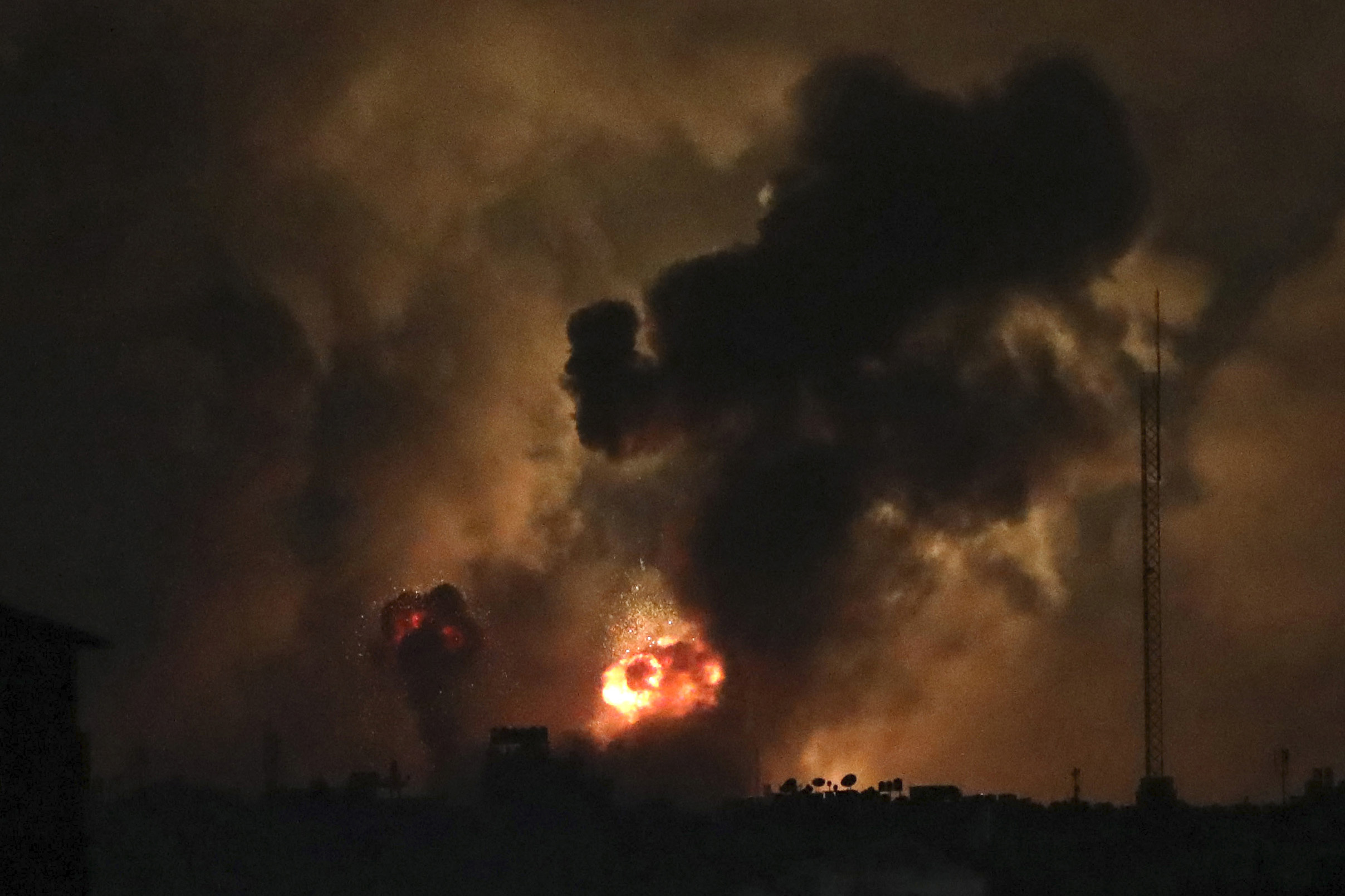 Smoke rises from explosions caused by Israeli airstrikes in the northern Gaza Strip