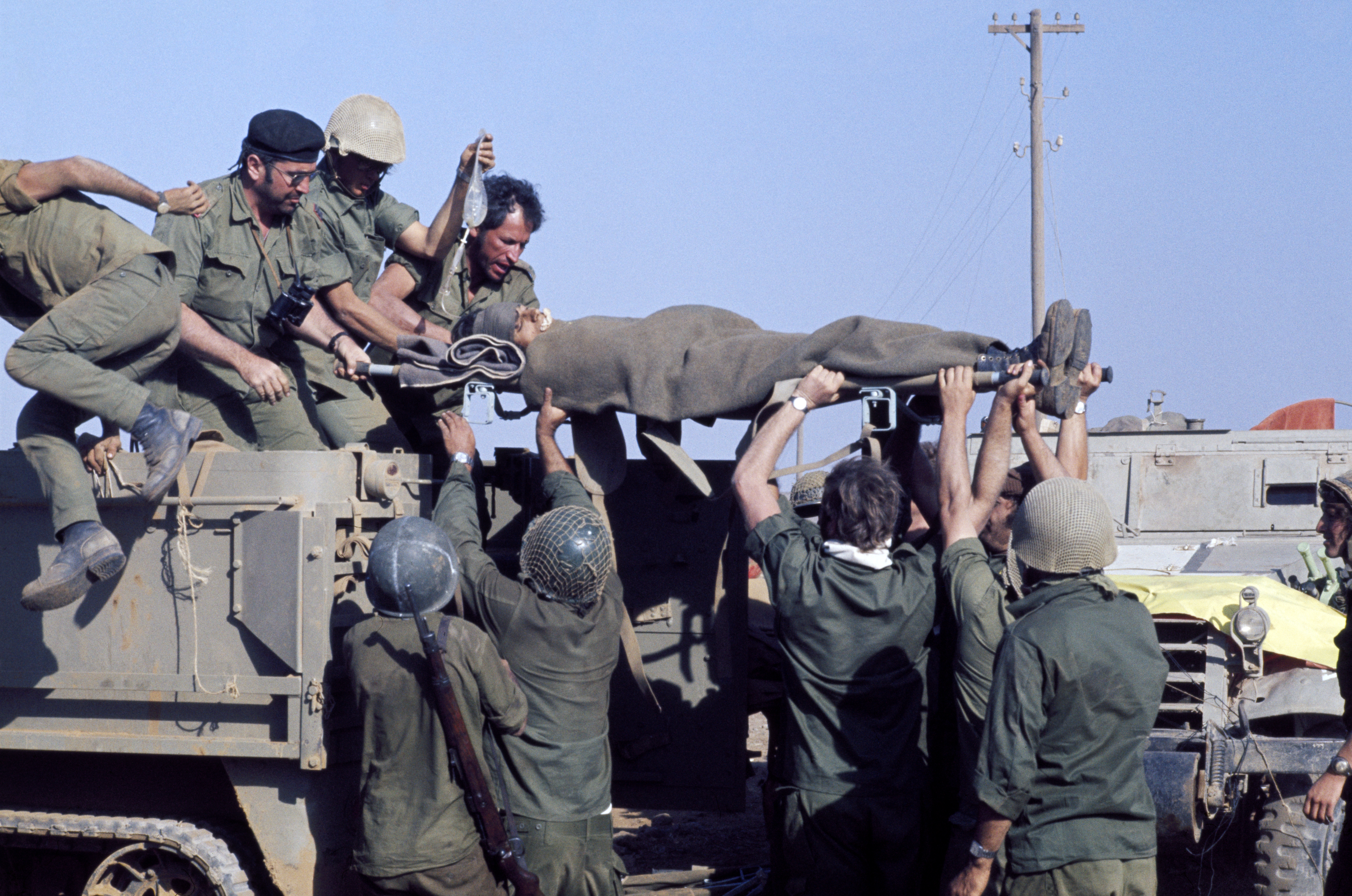 An Israelian soldier is wounded during the Yom Kippur War in the region of Golan Heights.
