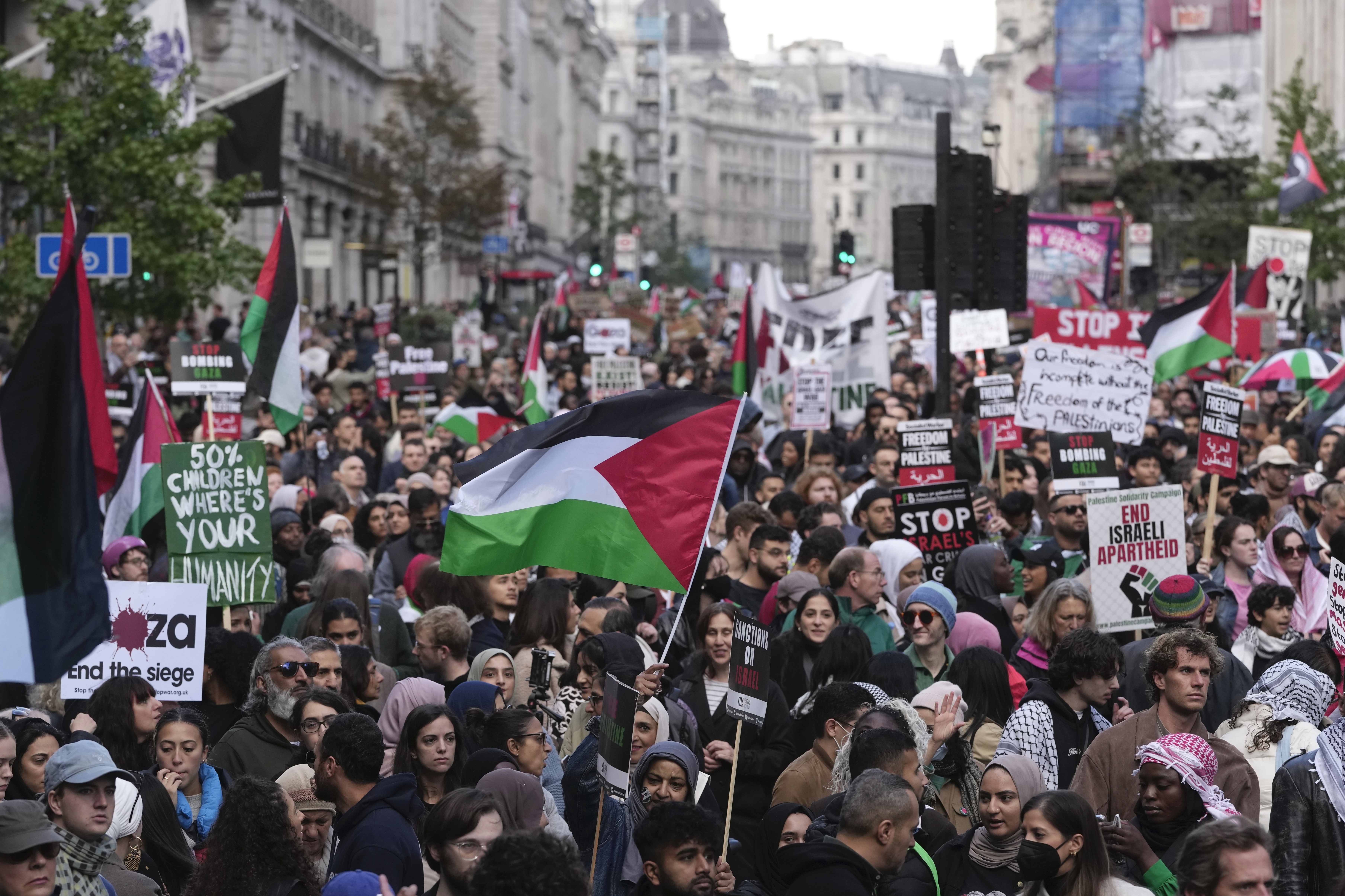 Protesters march during a pro Palestinian demonstration in London