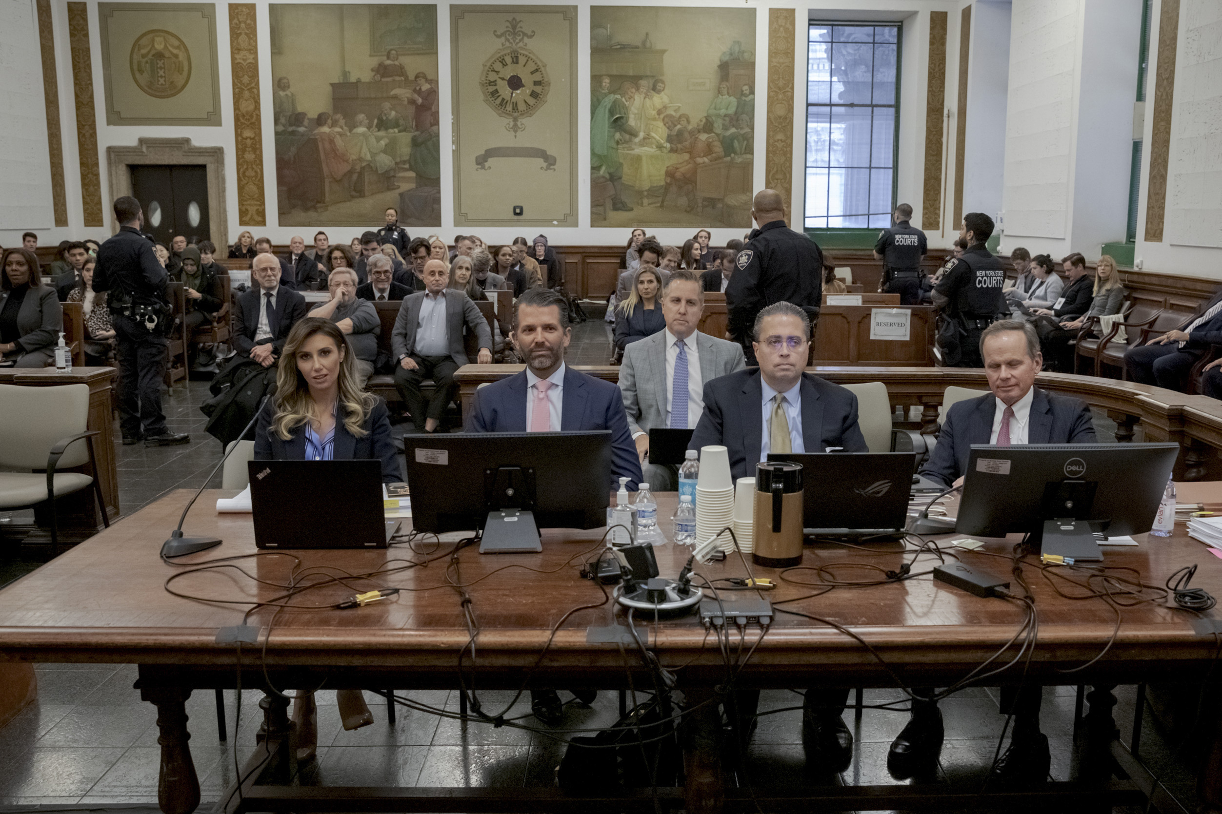 Donald Trump Jr., center left, participates in the civil business fraud trial against his father, former President Donald Trump, in New York Supreme Court, Wednesday, Nov. 1, 2023, in New York.