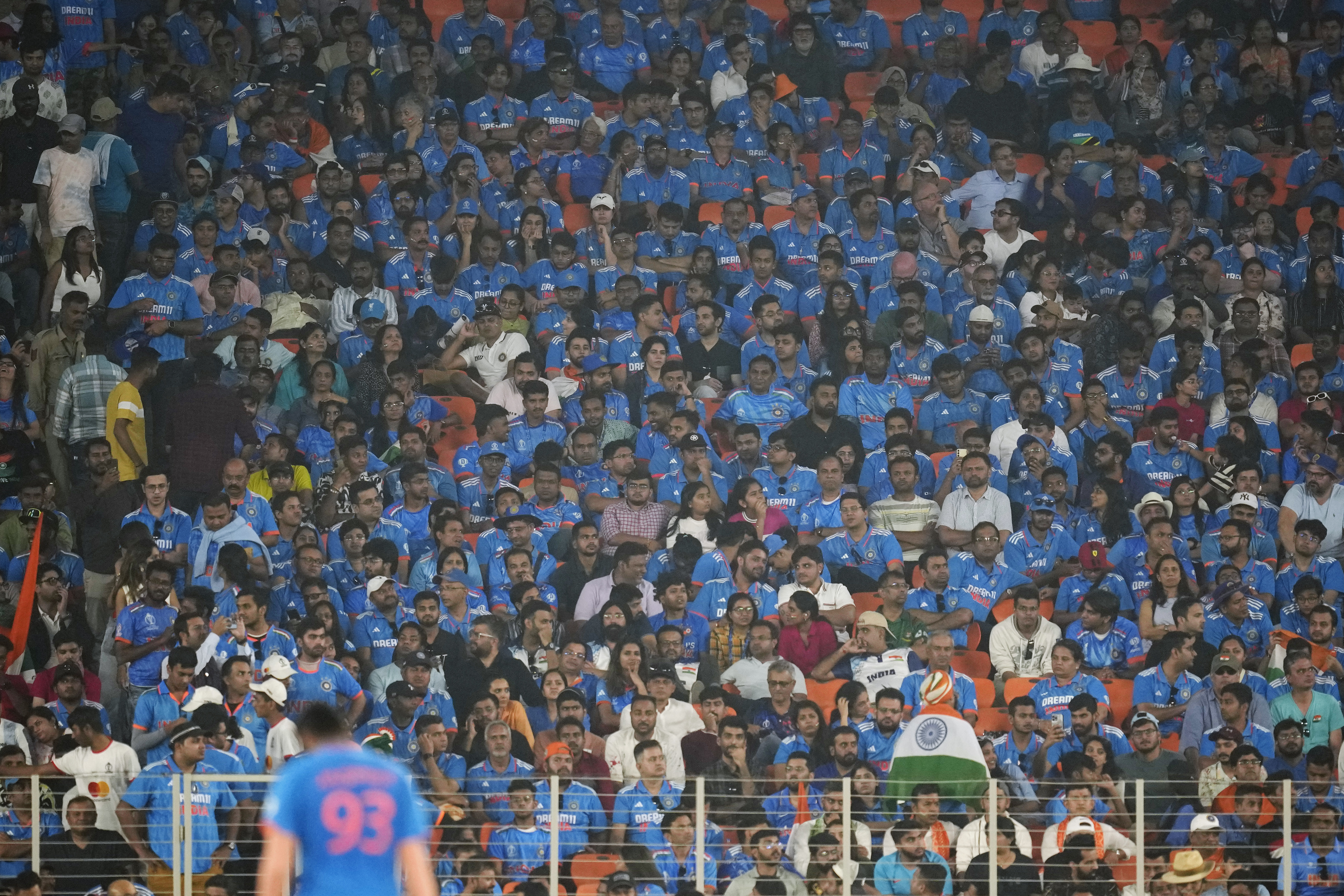 India fans sit dejected during the ICC Men's Cricket World Cup final match between Australia and India in Ahmedabad, India.