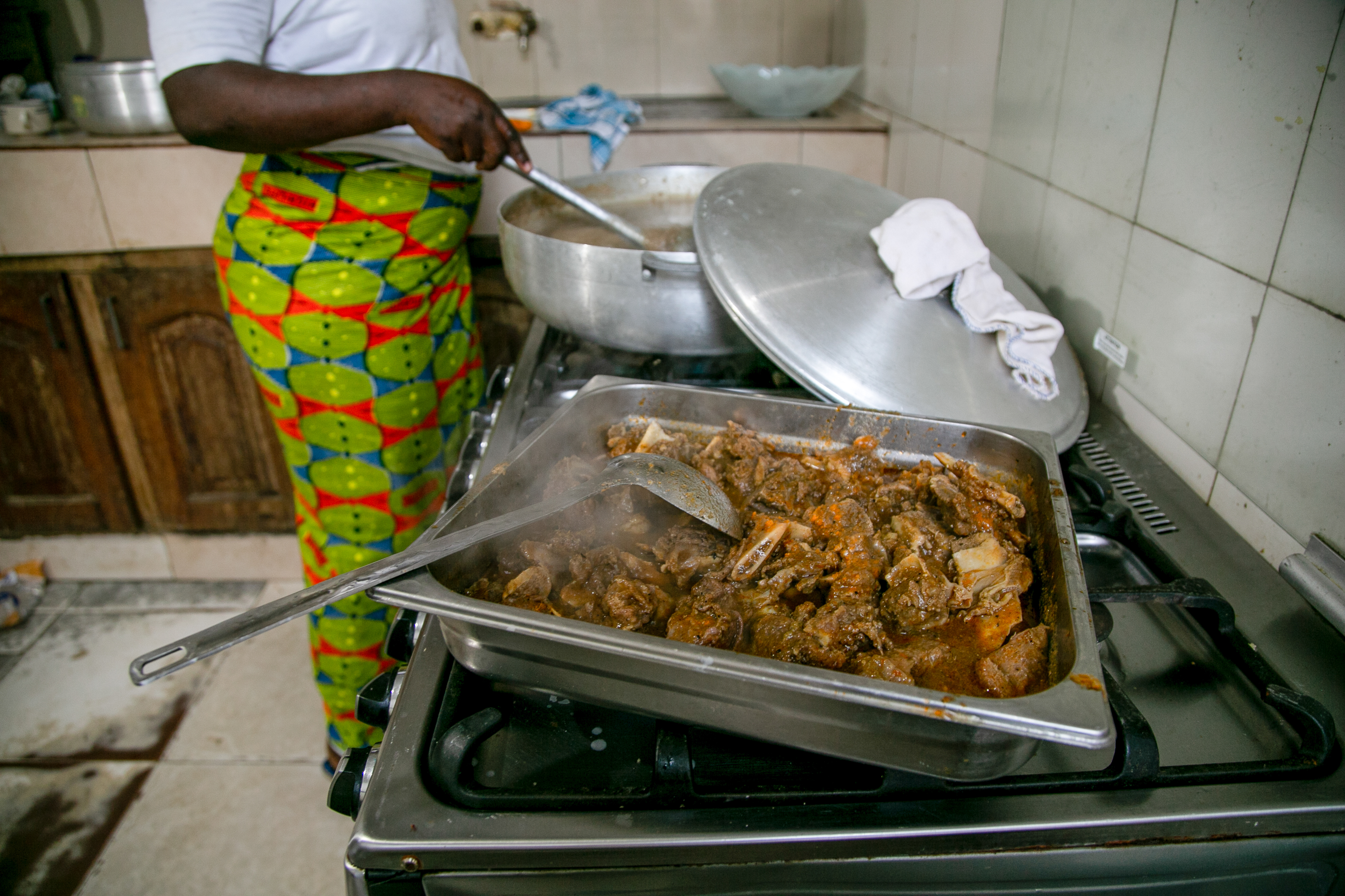 The cook prepares a kosher meal for Yom Kippur. After fish, beef is the most consumed animal protein in the country, according to the African Development Fund. Jewish practices forbid certain fish and require that animals be slaughtered according to a specific and painless procedure, known as kosher
