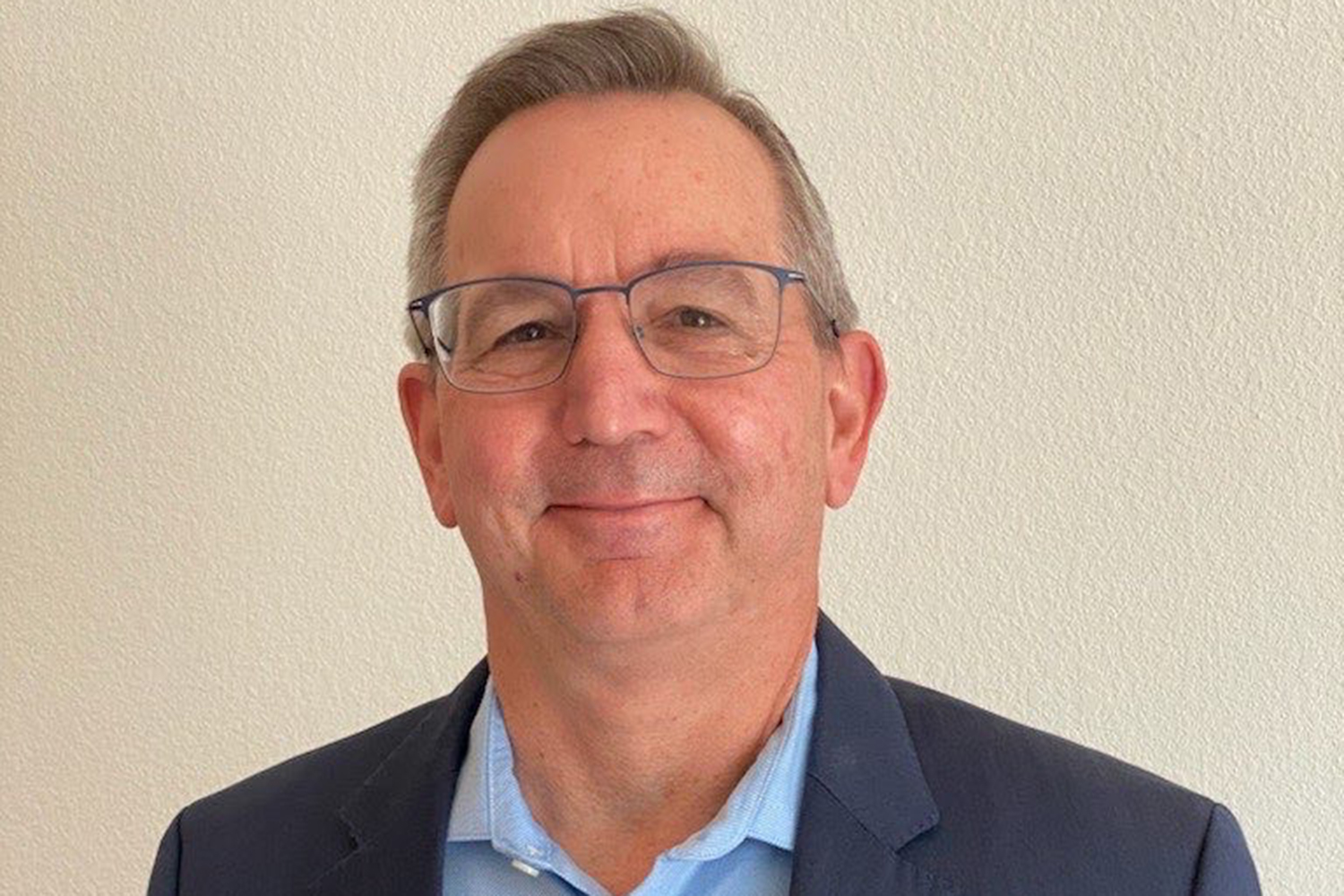 A portrait of Scot Marciel. She is smiling and looks relaxed.