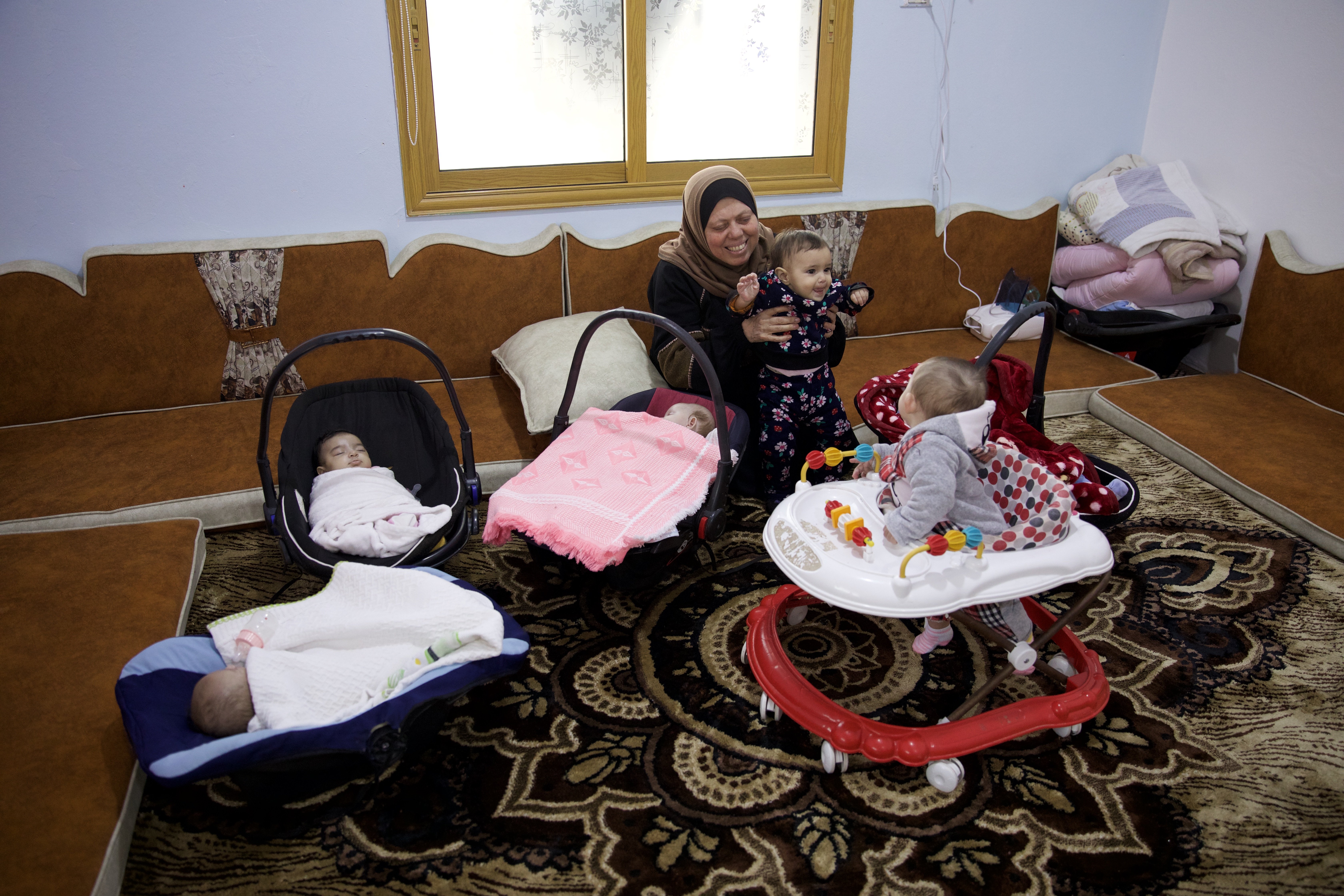 Om Abdo take of children in Child Houses center-1700430927