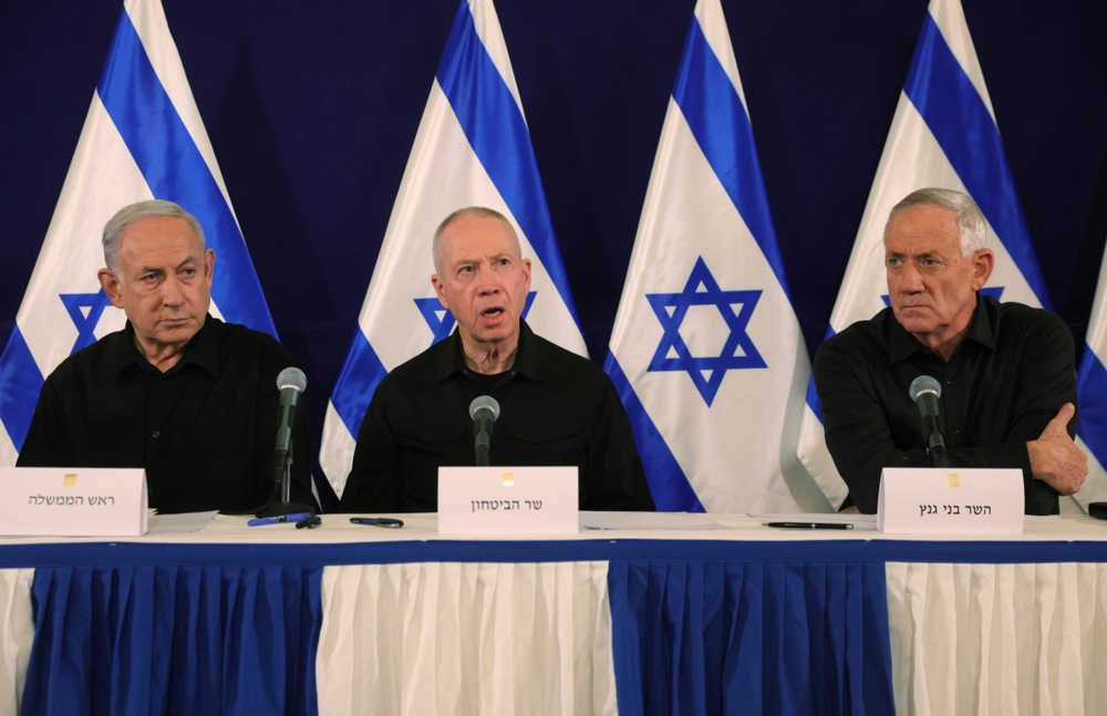 Israel's Prime Minister Benjamin Netanyahu, Defense Minister Yoav Gallant and Cabinet Minister Benny Gantz address a press conference in The Kirya military base in Tel Aviv, Israel, 28 October 2023.