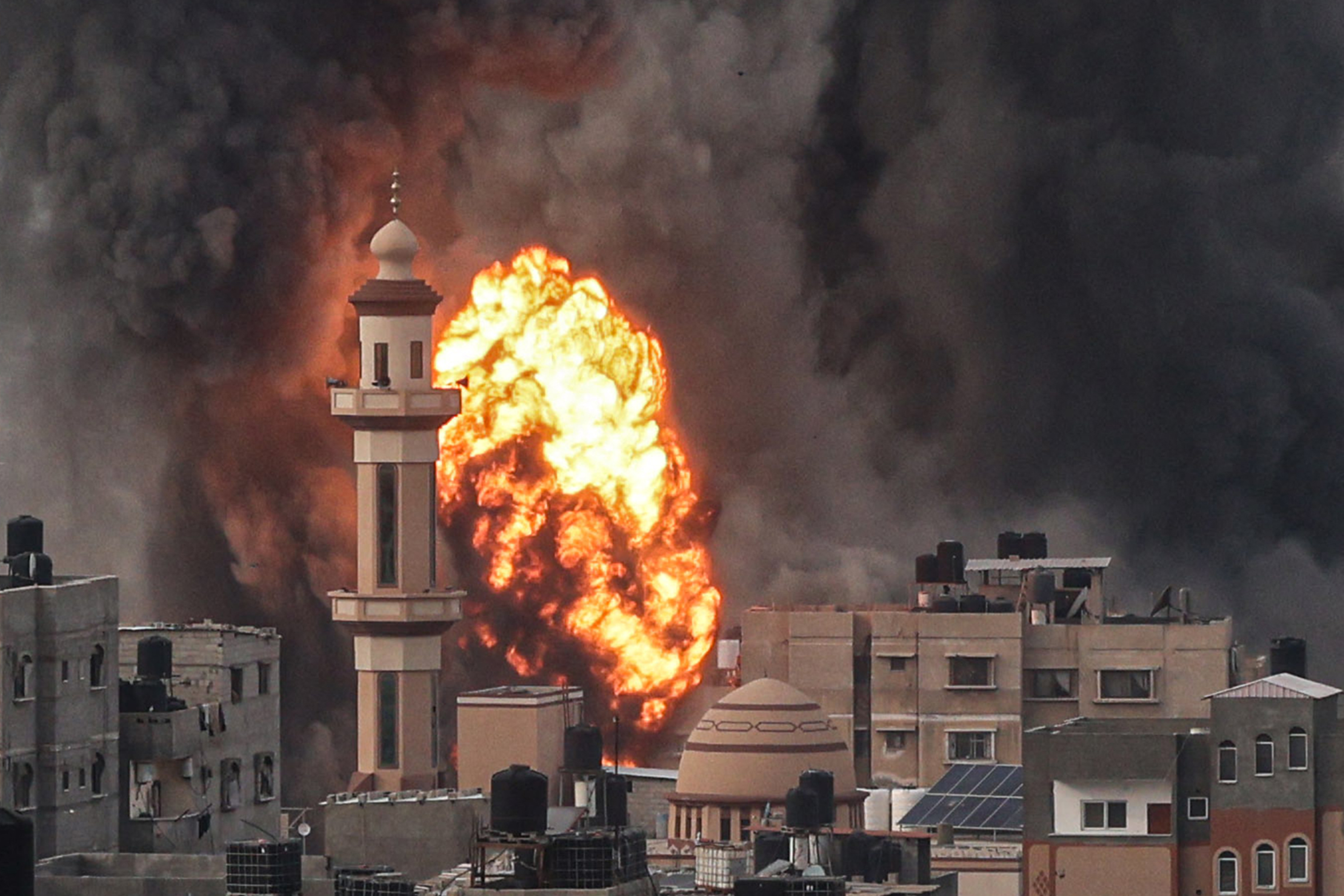 A fireball erupts after Israeli strike over Rafah in the southern Gaza Strip on December 20, 2023, amid ongoing battles between Israel and the Palestinian militant group Hamas.