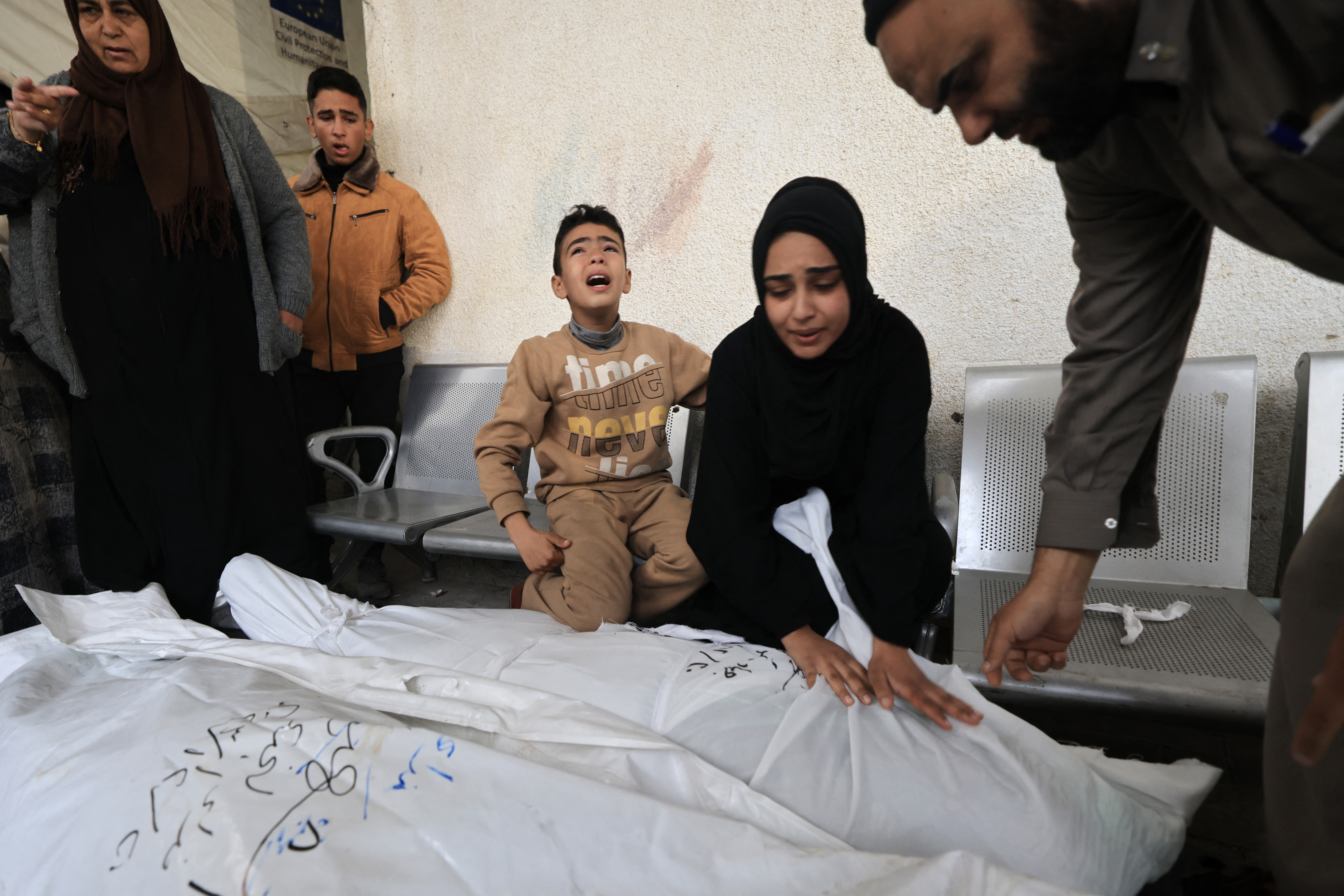 Relatives of Jehad Arafat, who was killed in Israeli bombardment,
