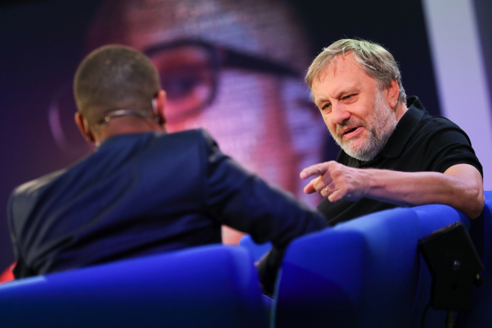 epa07087609 Slovenian philosopher Slavoj Zizek (R) speaks at the authors' forum 'Blue Sofa' during the book fair 'Frankfurter Buchmesse 2018', in Frankfurt am Main, Germany, 12 October 2018. The 70th edition of the international Frankfurt Book Fair, described as the 'world's most important fair for the print and digital content business' runs from 10 to 14 October and gathers authors, writers and celebrities from all over the world. This year's Guest of Honour country is Georgia. EPA-EFE/HAYOUNG JEON