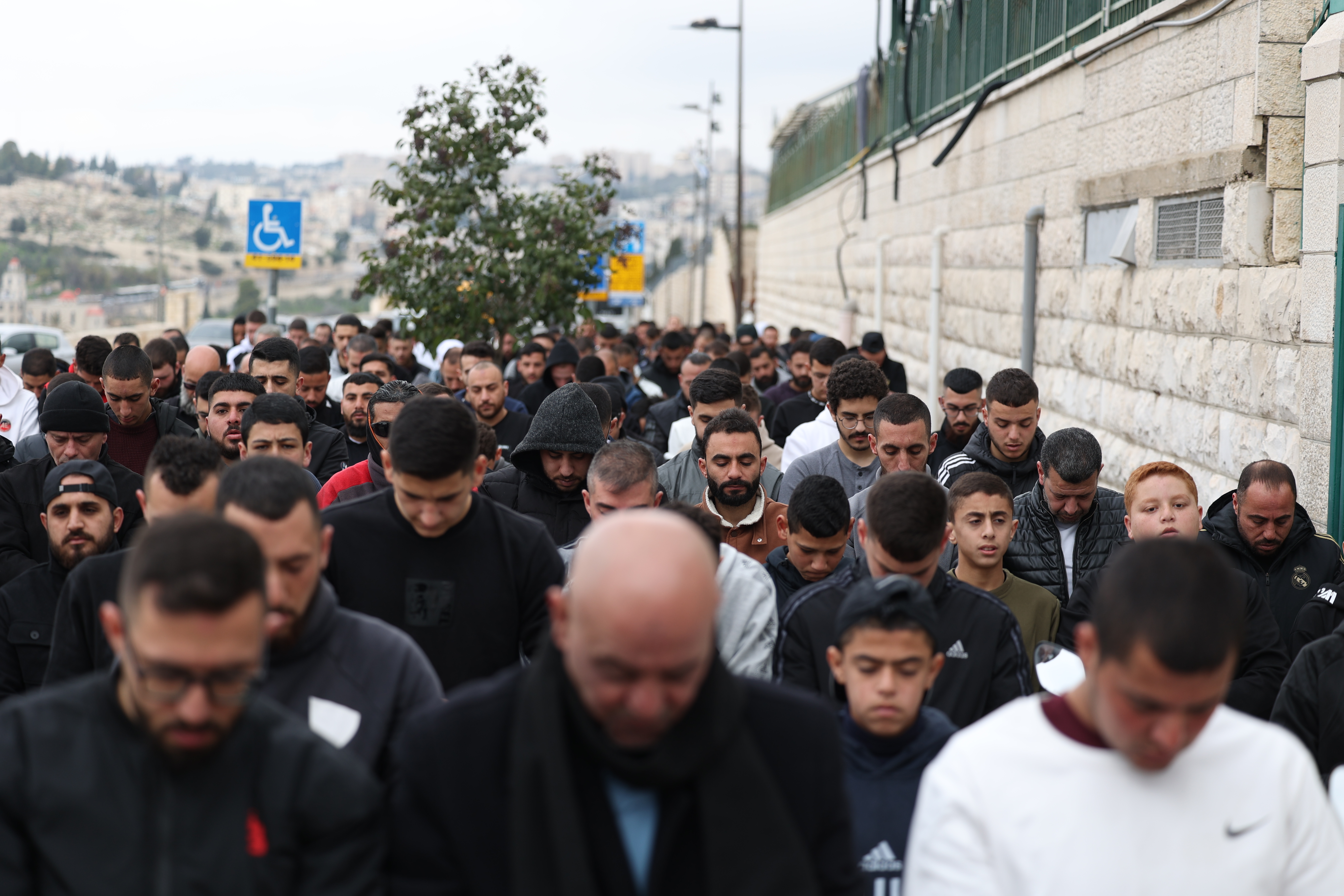Israeli forces take security measures as the Palestinians perform their Friday prayers at the Wadi al-Jawiz and Ra's al-Amud neighborhoods as the Israeli forces continue to impose restrictions on Palestinians in East Jerusalem on December 29