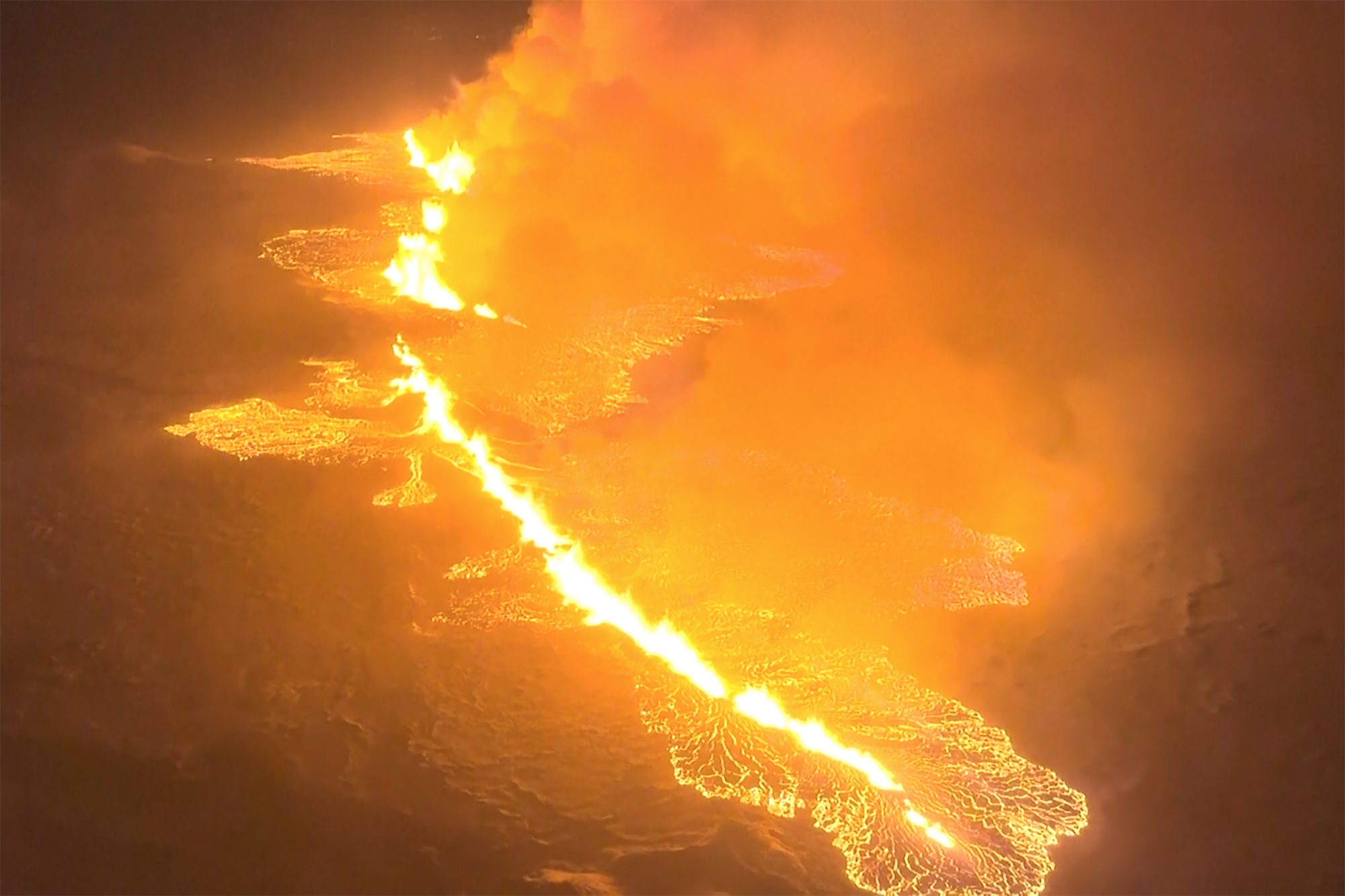A volcano spews lava and smoke as it erupts in Grindavik, Iceland