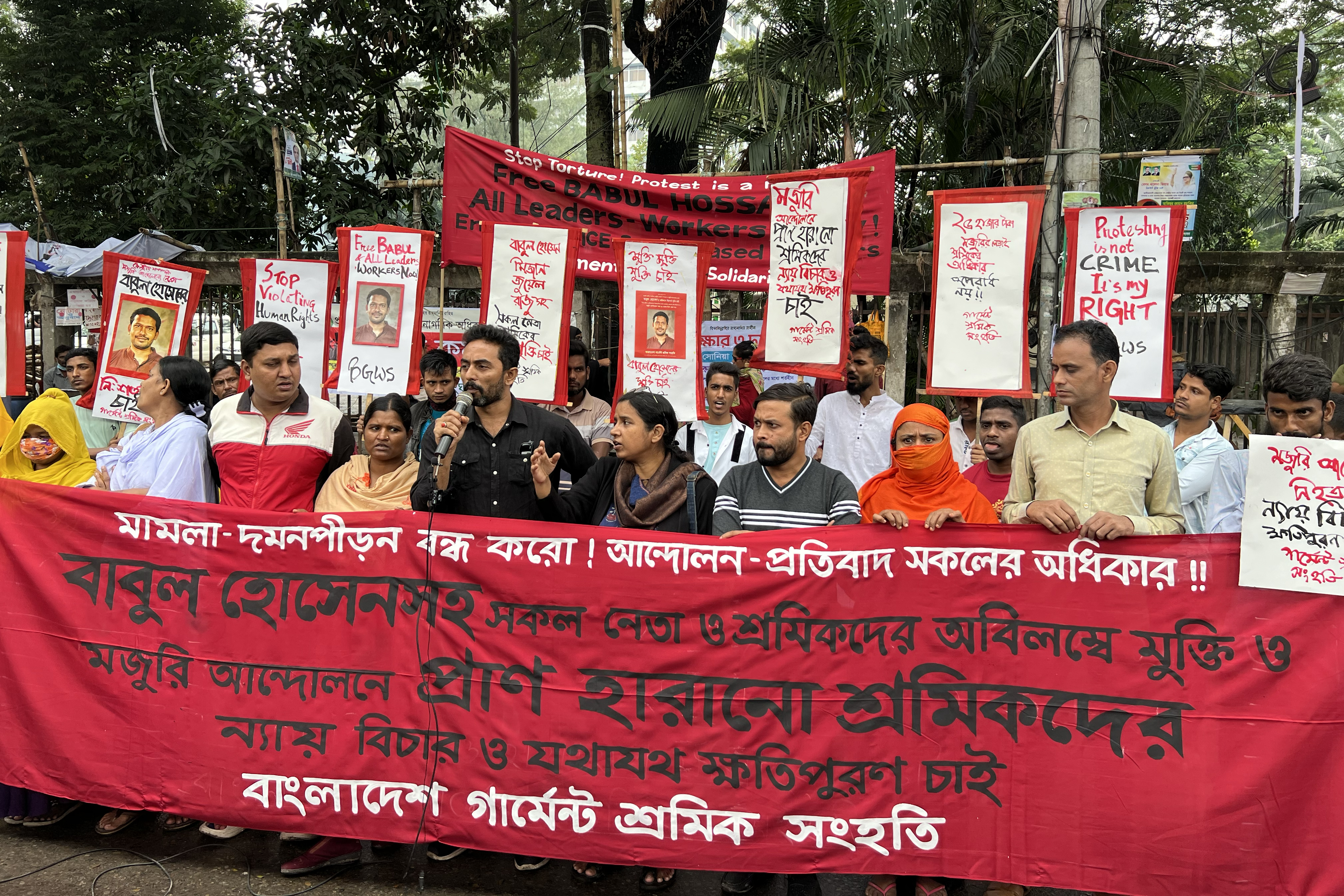 Activists protesting the arrest of workers in recent wage hike protest