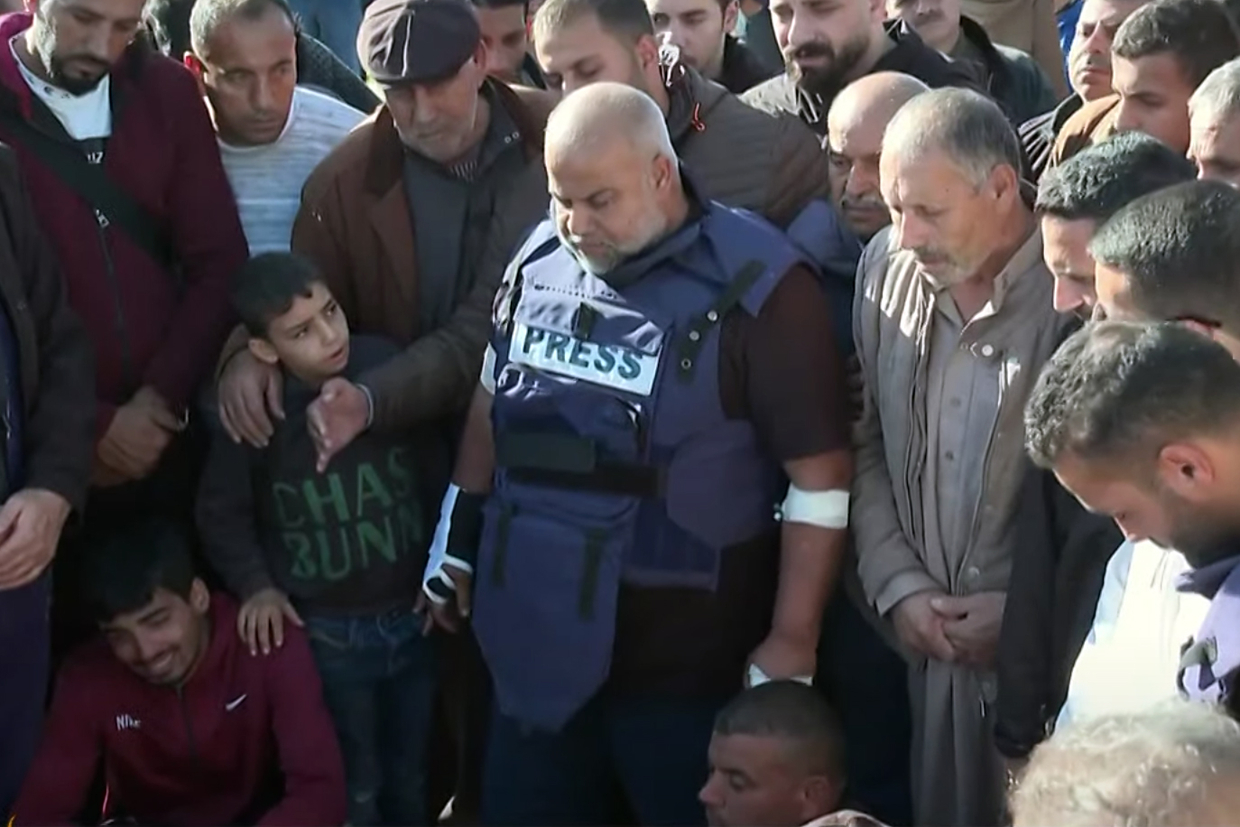 A funeral attended by dozens of mourners has been held for Al Jazeera cameraman Samer Abudaqa in Gaza’s southern city of Khan Younis [Screengrab/Al Jazeera]