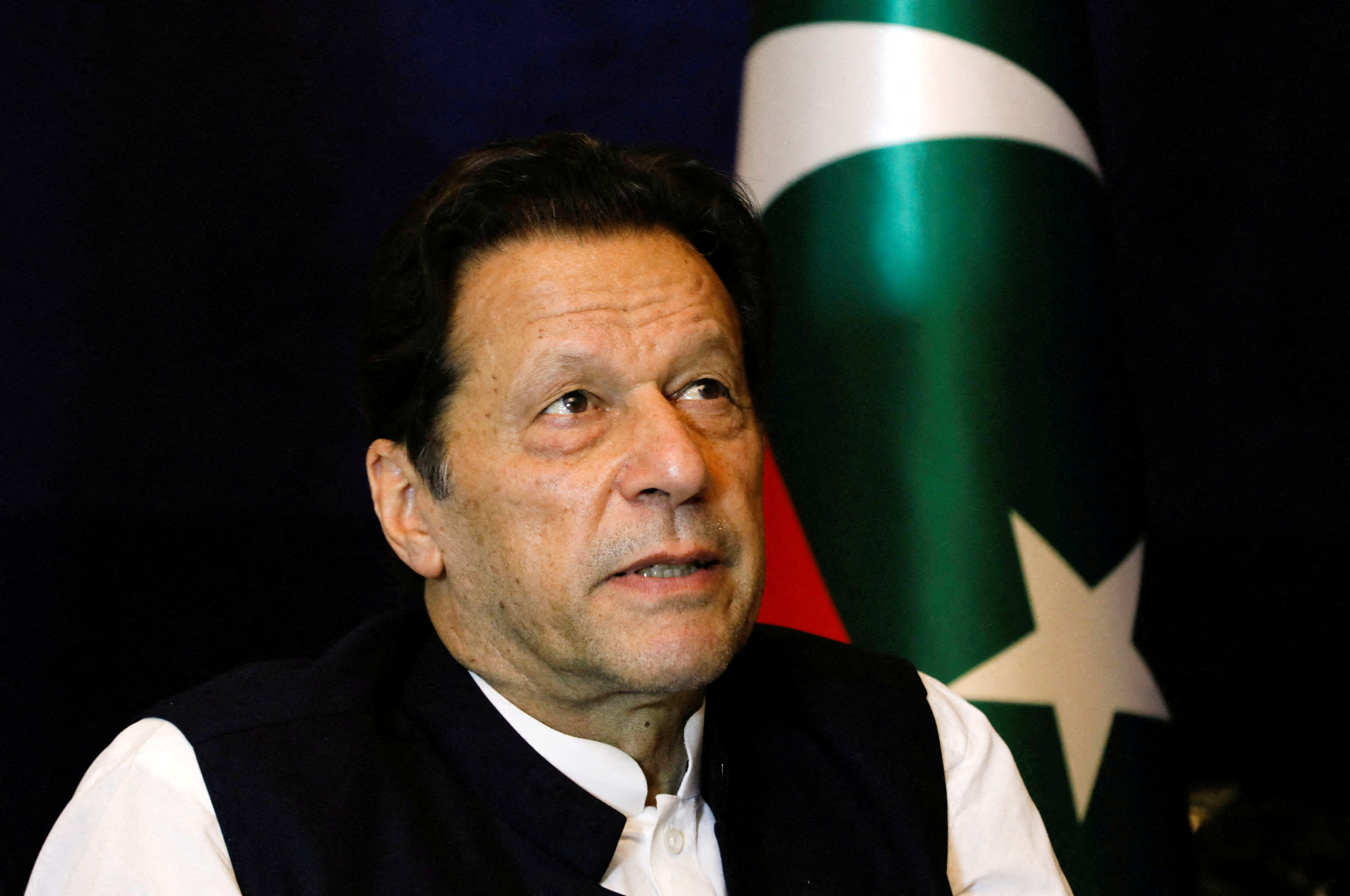 Imran Khan pauses as he speaks with Reuters during an interview, in Lahore, Pakistan.